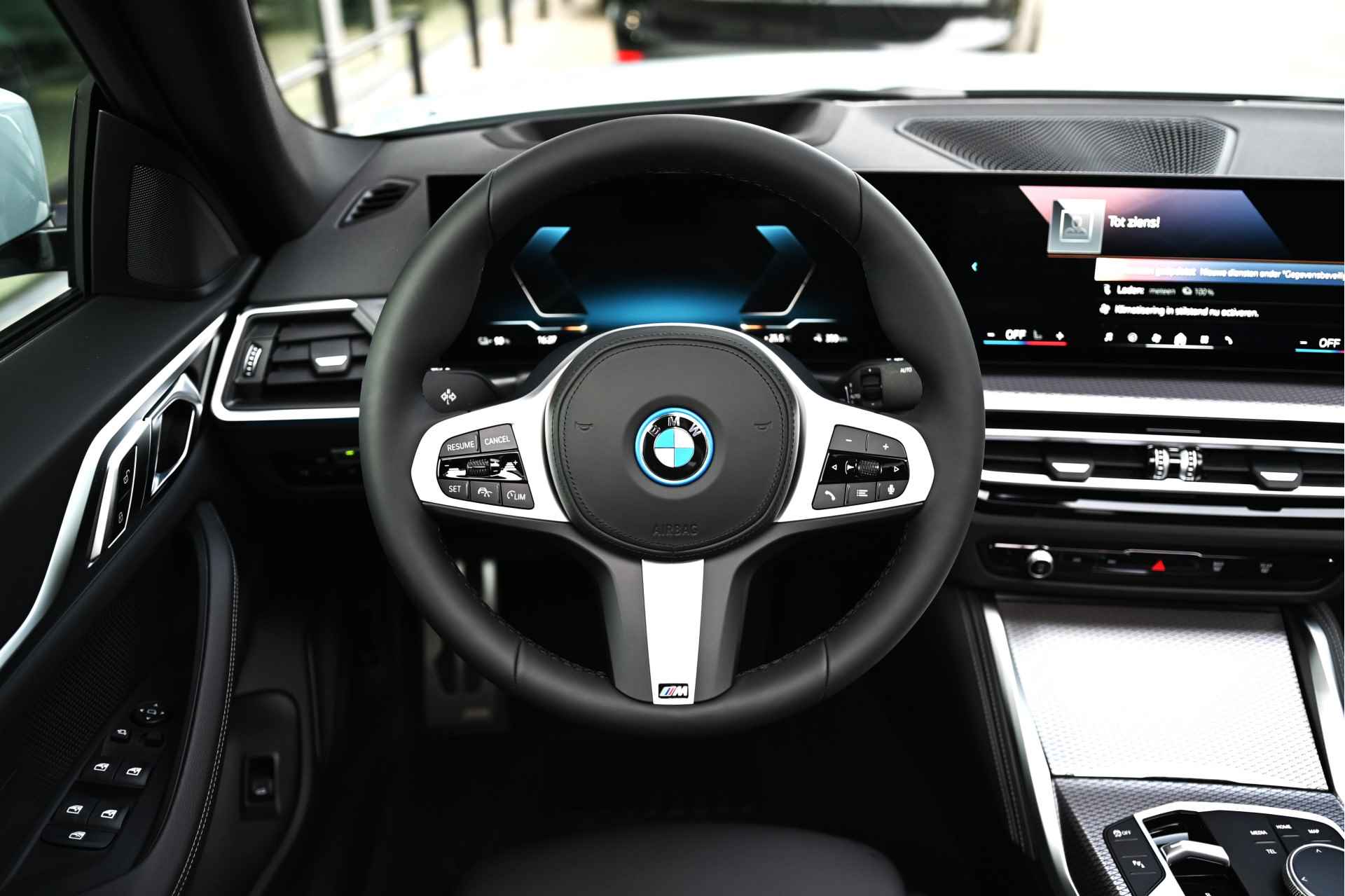 BMW i4 eDrive35 High Executive M Sport 70 kWh / Schuif-kanteldak / Active Cruise Control / Stoelverwarming / Parking Assistant / Live Cockpit Professional - 9/24
