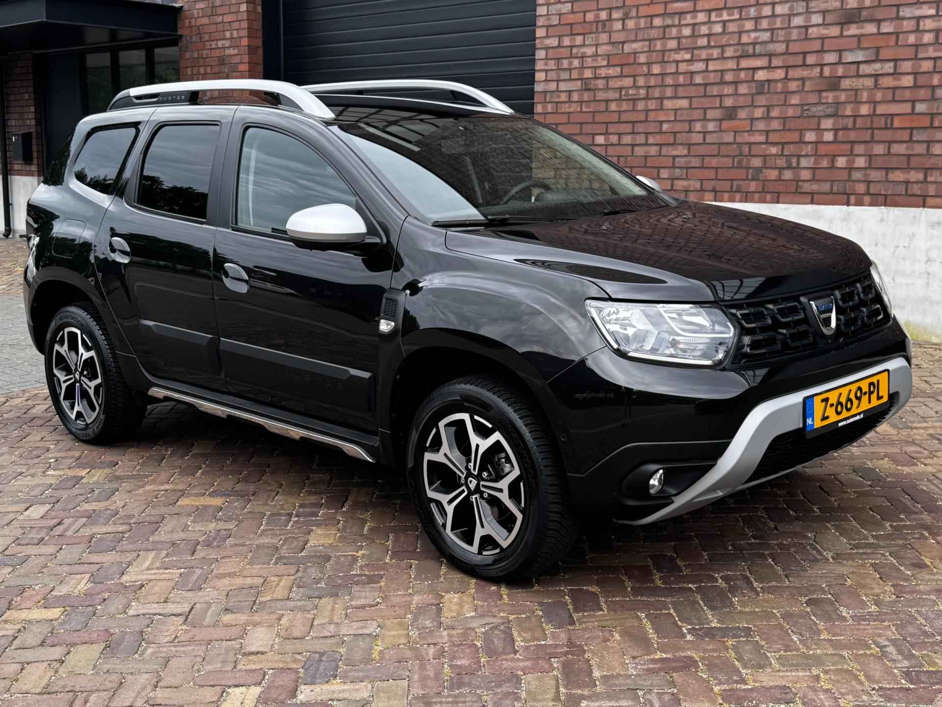 Dacia Duster 1.3 TCe Prestige / 130 PK / Trekhaak / Navigatie + Camera Rondom / Climate Control / Stoelverwarming - 6/52