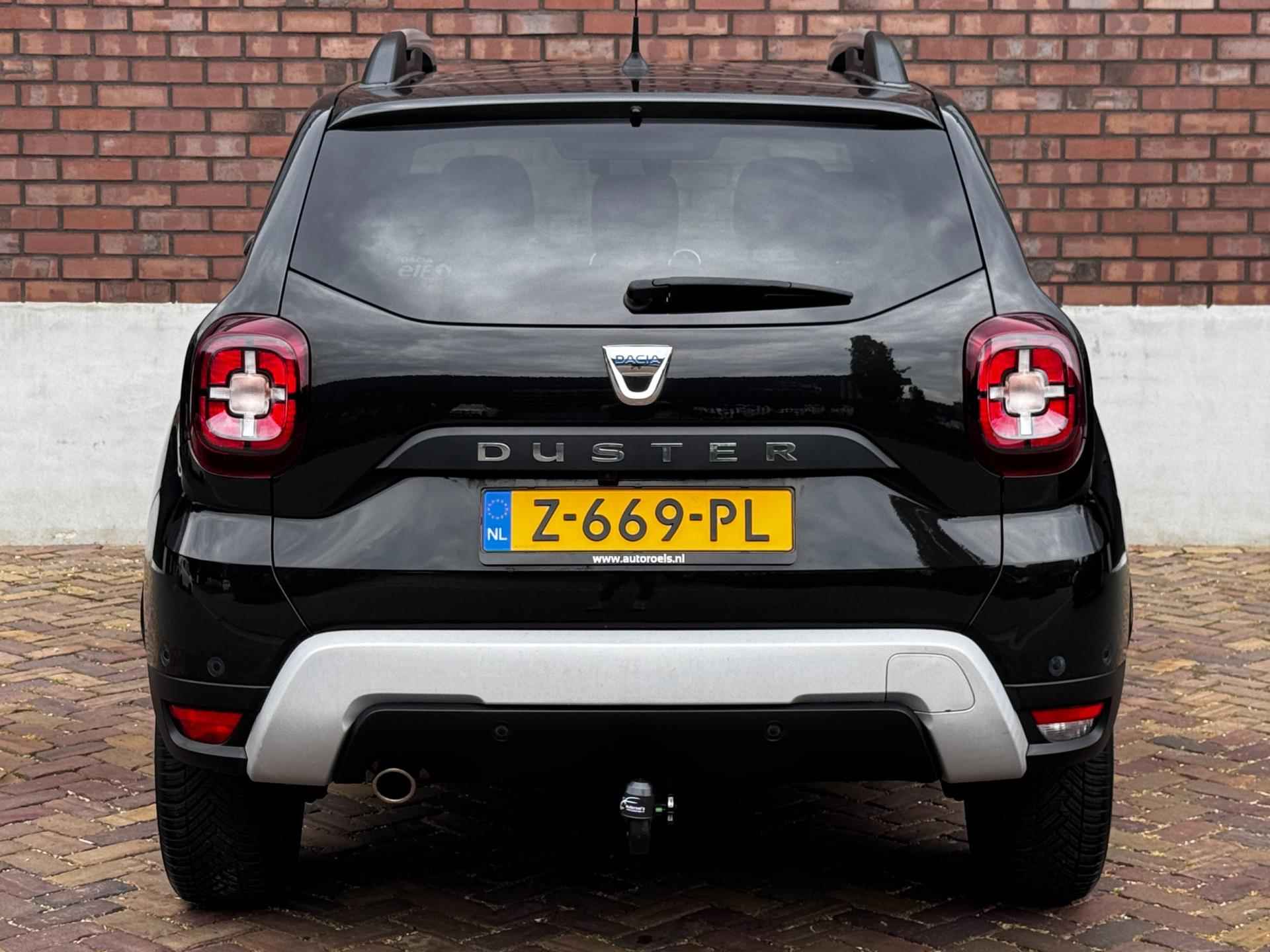 Dacia Duster 1.3 TCe Prestige / 130 PK / Trekhaak / Navigatie + Camera Rondom / Climate Control / Stoelverwarming - 11/52