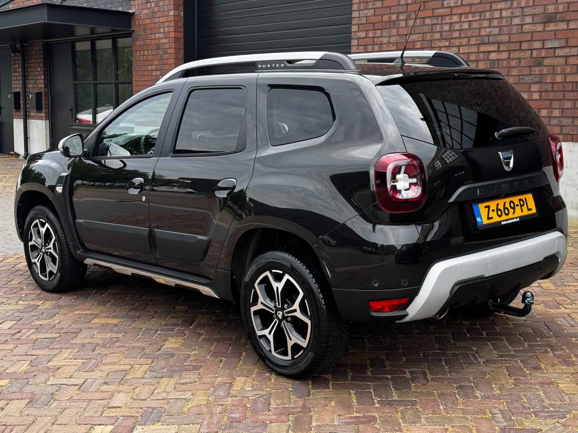 Dacia Duster 1.3 TCe Prestige / 130 PK / Trekhaak / Navigatie + Camera Rondom / Climate Control / Stoelverwarming - 12/52