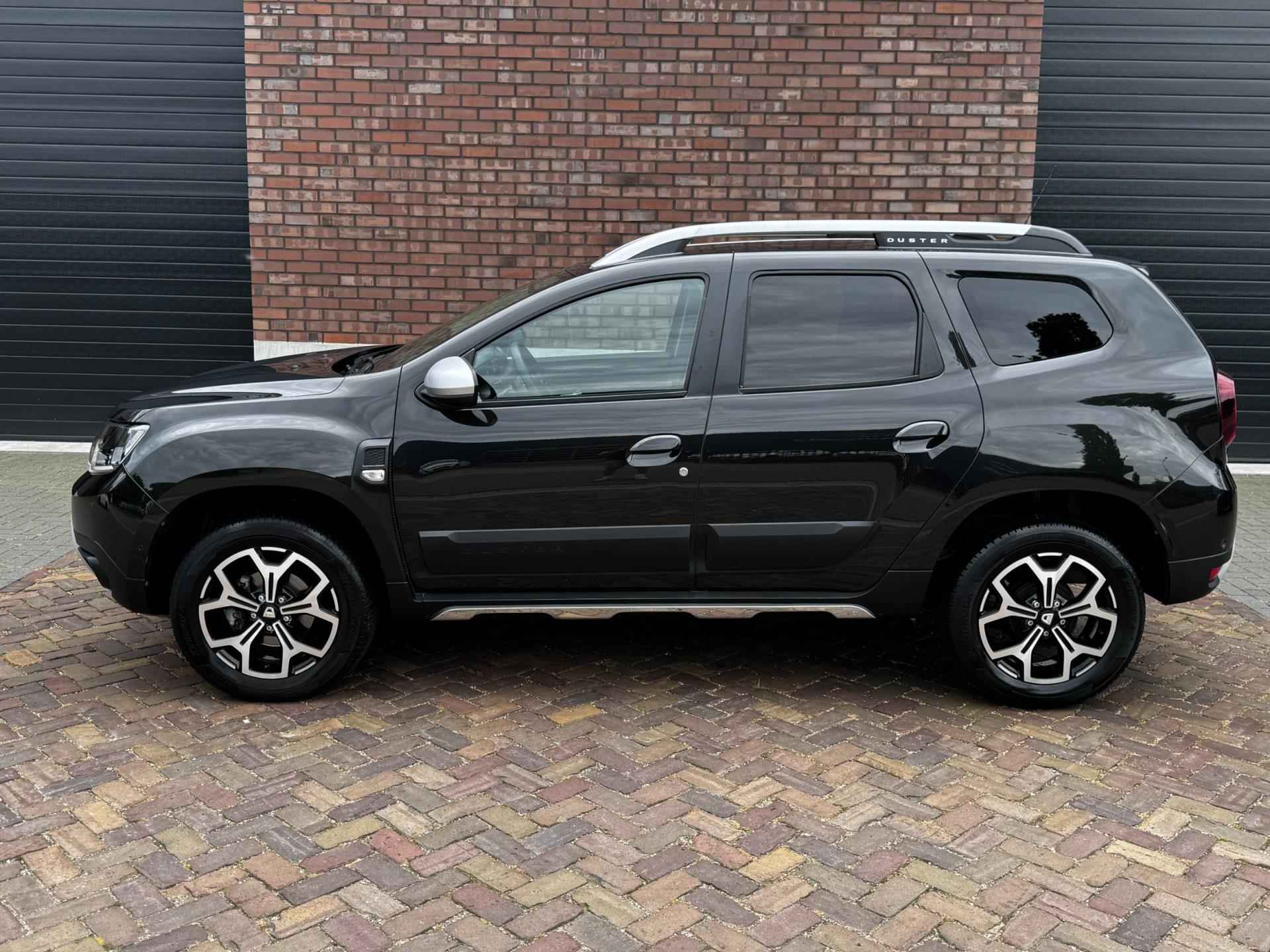 Dacia Duster 1.3 TCe Prestige / 130 PK / Trekhaak / Navigatie + Camera Rondom / Climate Control / Stoelverwarming - 13/52