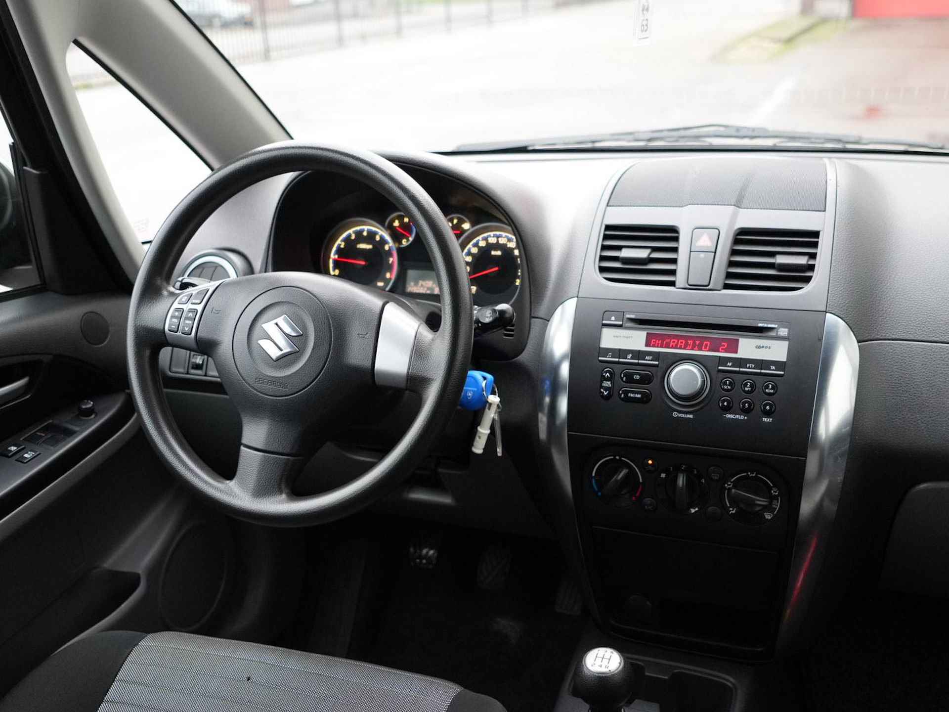 Suzuki SX4 1.6 Comfort | Airco | Radio CD MP3 | Dakrails | Stuurwielbediening | - 18/29