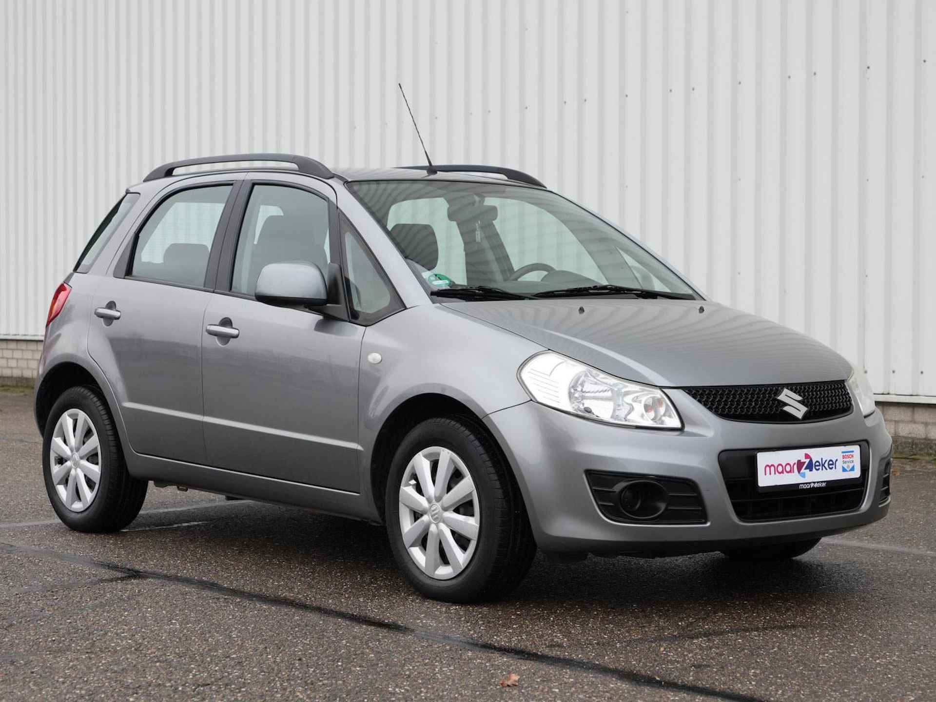 Suzuki SX4 1.6 Comfort | Airco | Radio CD MP3 | Dakrails | Stuurwielbediening | - 29/29