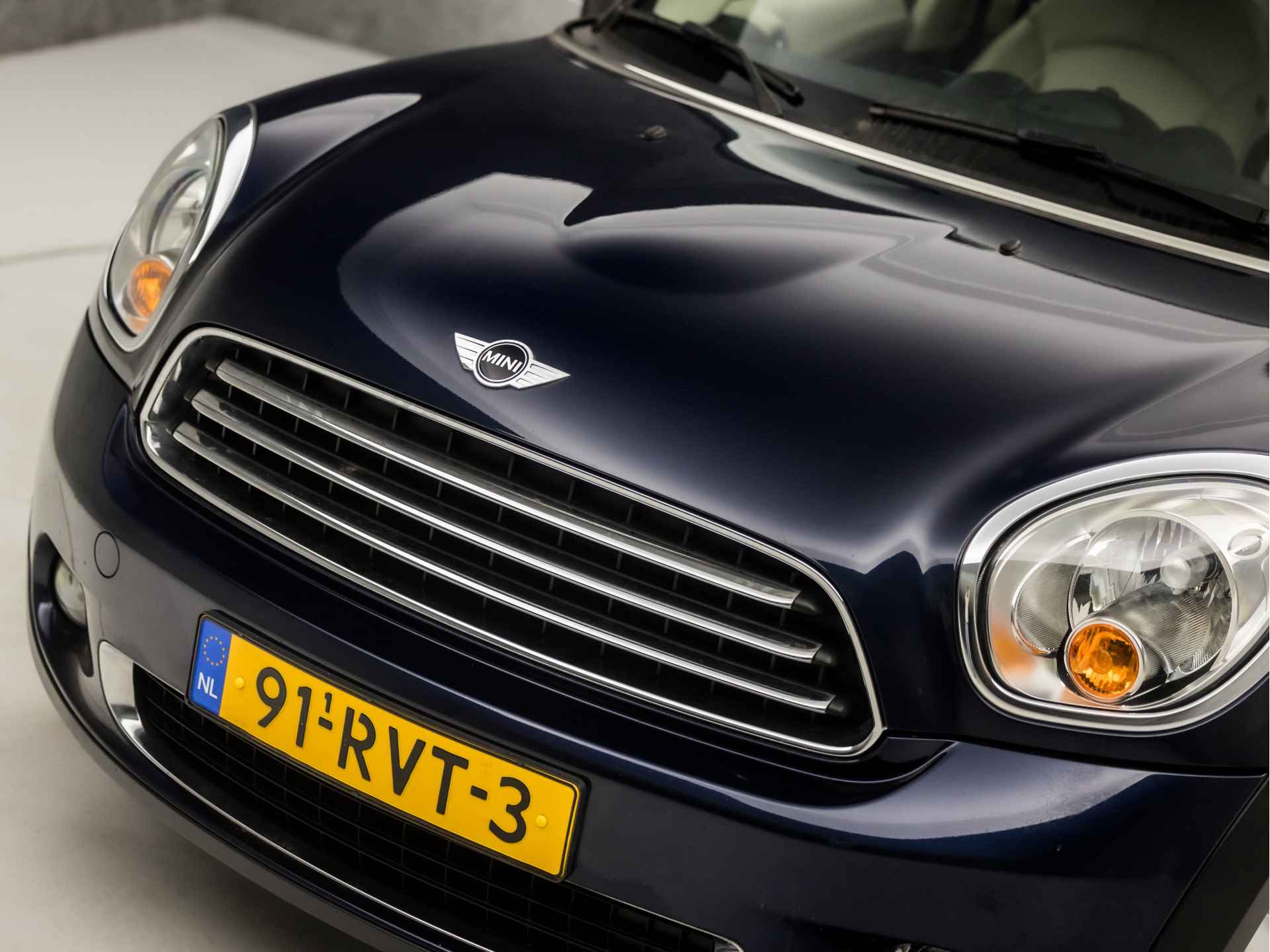 MINI Countryman 1.6 Cooper Luxury (PANORAMADAK, CLIMATE, STOELVERWARMING, CRUISE, LEDEREN SPORTSTOELEN, ARMSTEUN, PARKEERSENSOREN, NIEUWE APK, LM VELGEN, NIEUWSTAAT) - 27/31