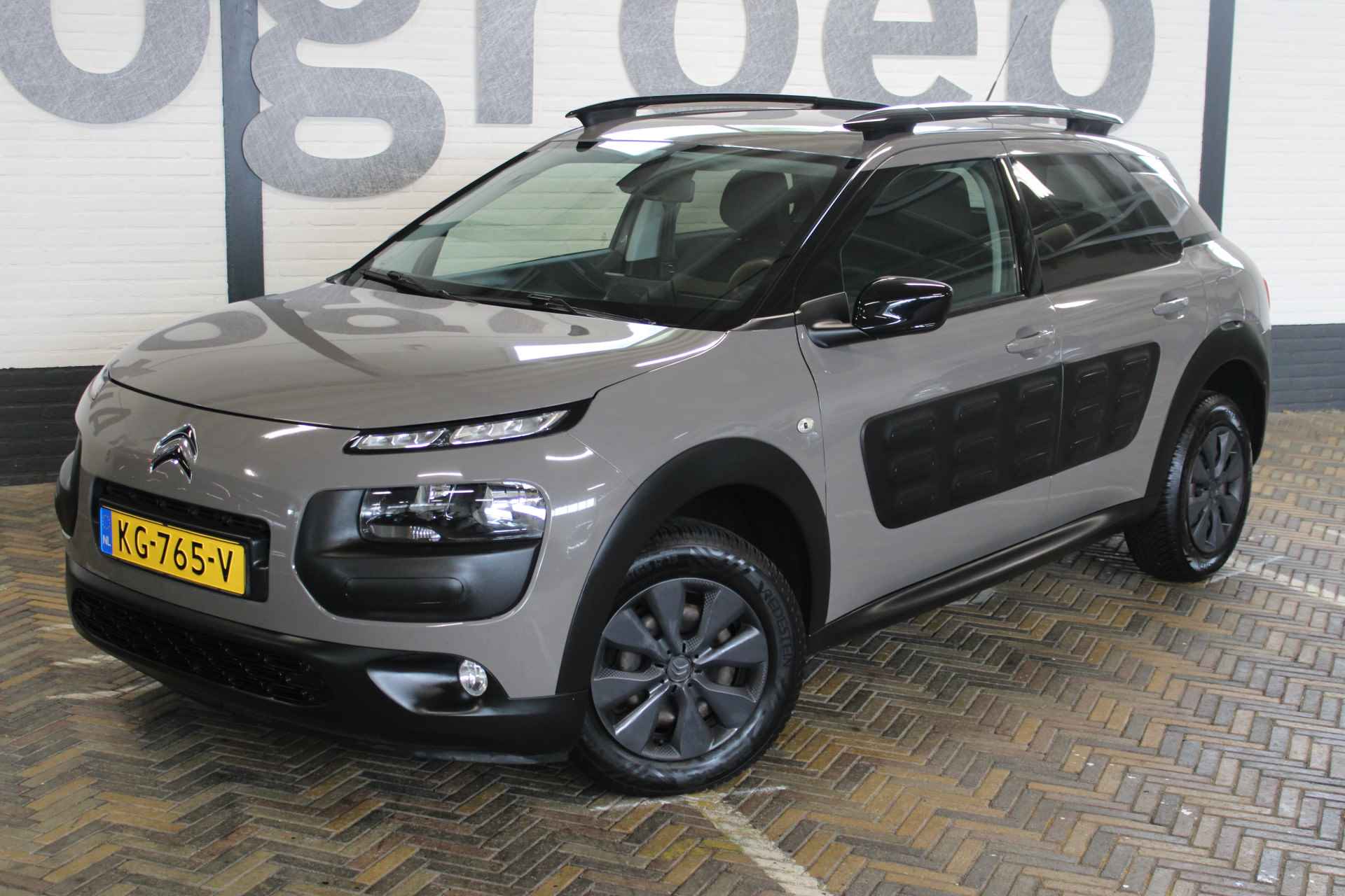 Citroën C4 Cactus 1.2 PureTech Shine | Incl. 12 maanden garantie | Navigatie | Cruise control | Climate control | DAB radio | Regensensor | 1e eigenaar | Parkeersensoren + Achteruitrijcamera | - 6/43