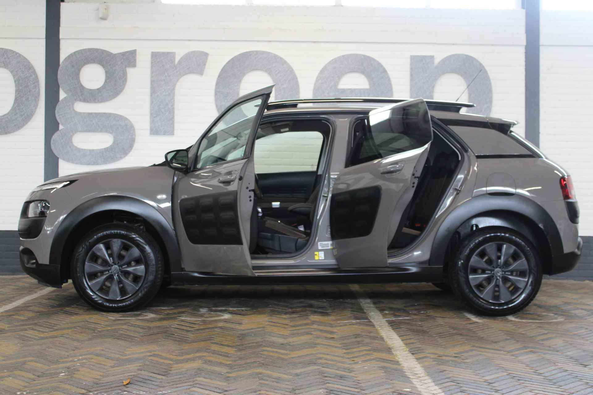 Citroën C4 Cactus 1.2 PureTech Shine | Incl. 12 maanden garantie | Navigatie | Cruise control | Climate control | DAB radio | Regensensor | 1e eigenaar | Parkeersensoren + Achteruitrijcamera | - 13/43