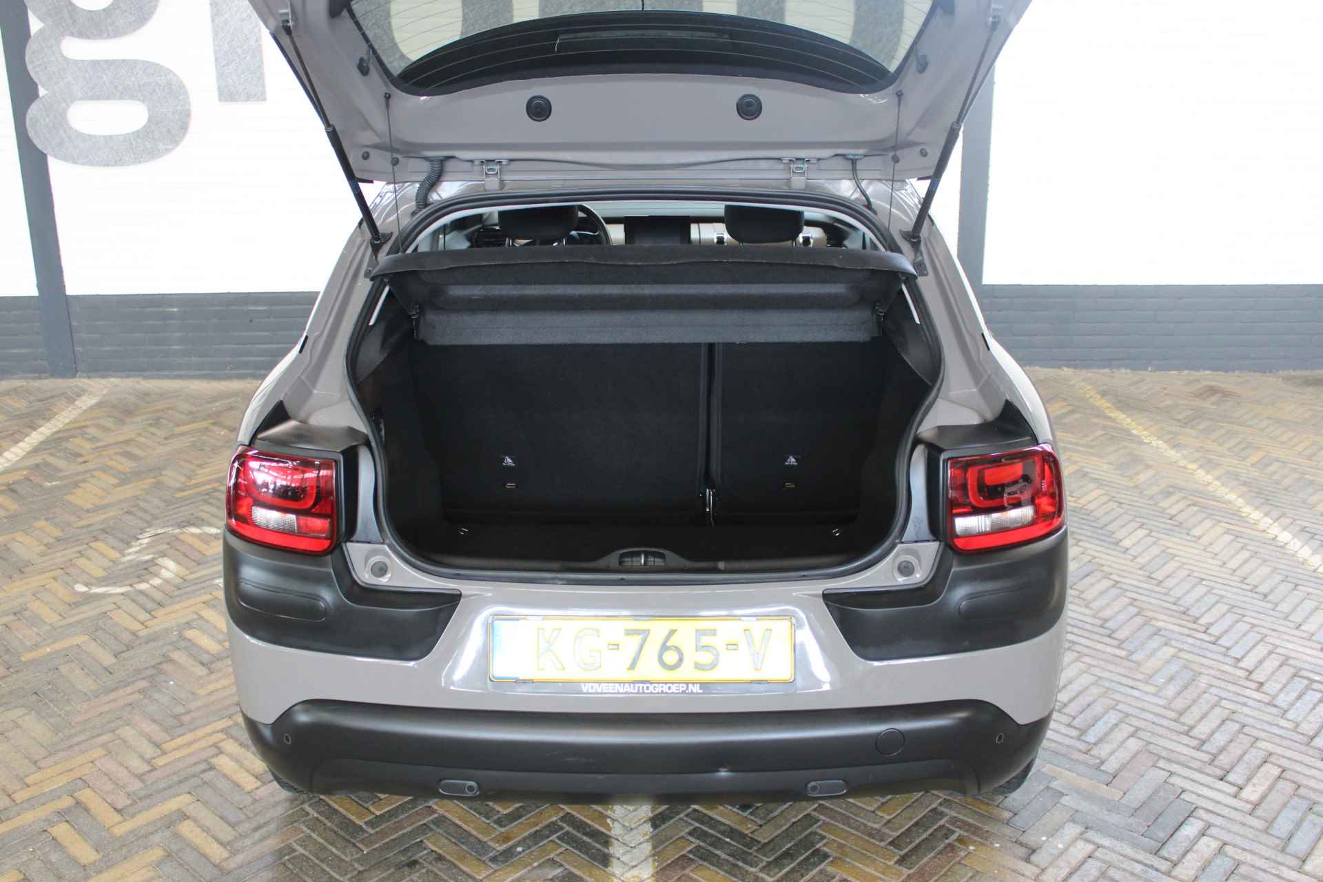 Citroën C4 Cactus 1.2 PureTech Shine | Incl. 12 maanden garantie | Navigatie | Cruise control | Climate control | DAB radio | Regensensor | 1e eigenaar | Parkeersensoren + Achteruitrijcamera | - 25/43