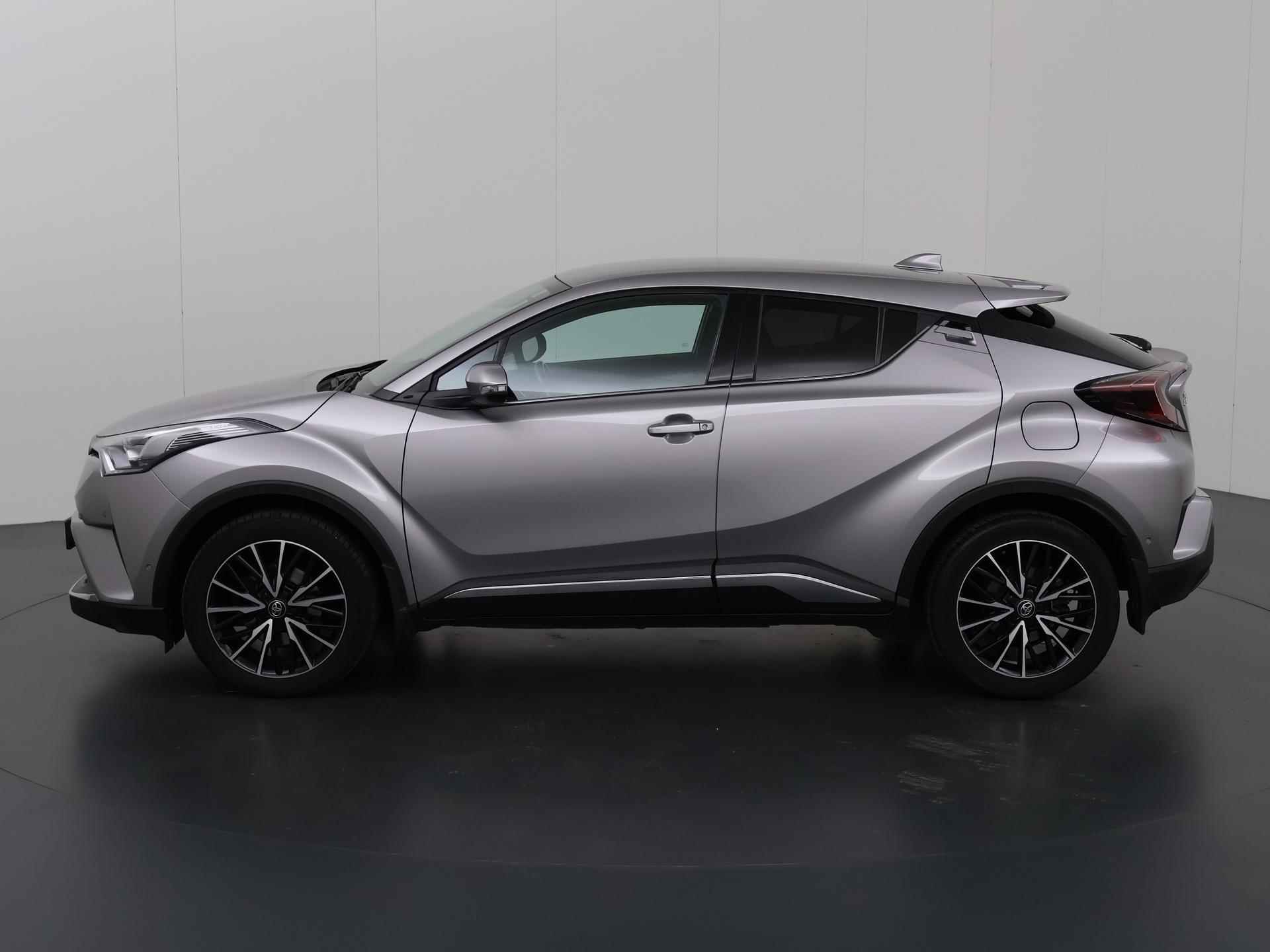 Toyota C-HR 1.2 Premium | Trekhaak | Camera | Navigatie | Stof/Leder combinatie | Stoelverwarming | Bluetooth | Rij-hulp-Systeem | Cruise Control | Climate Control | - 6/39