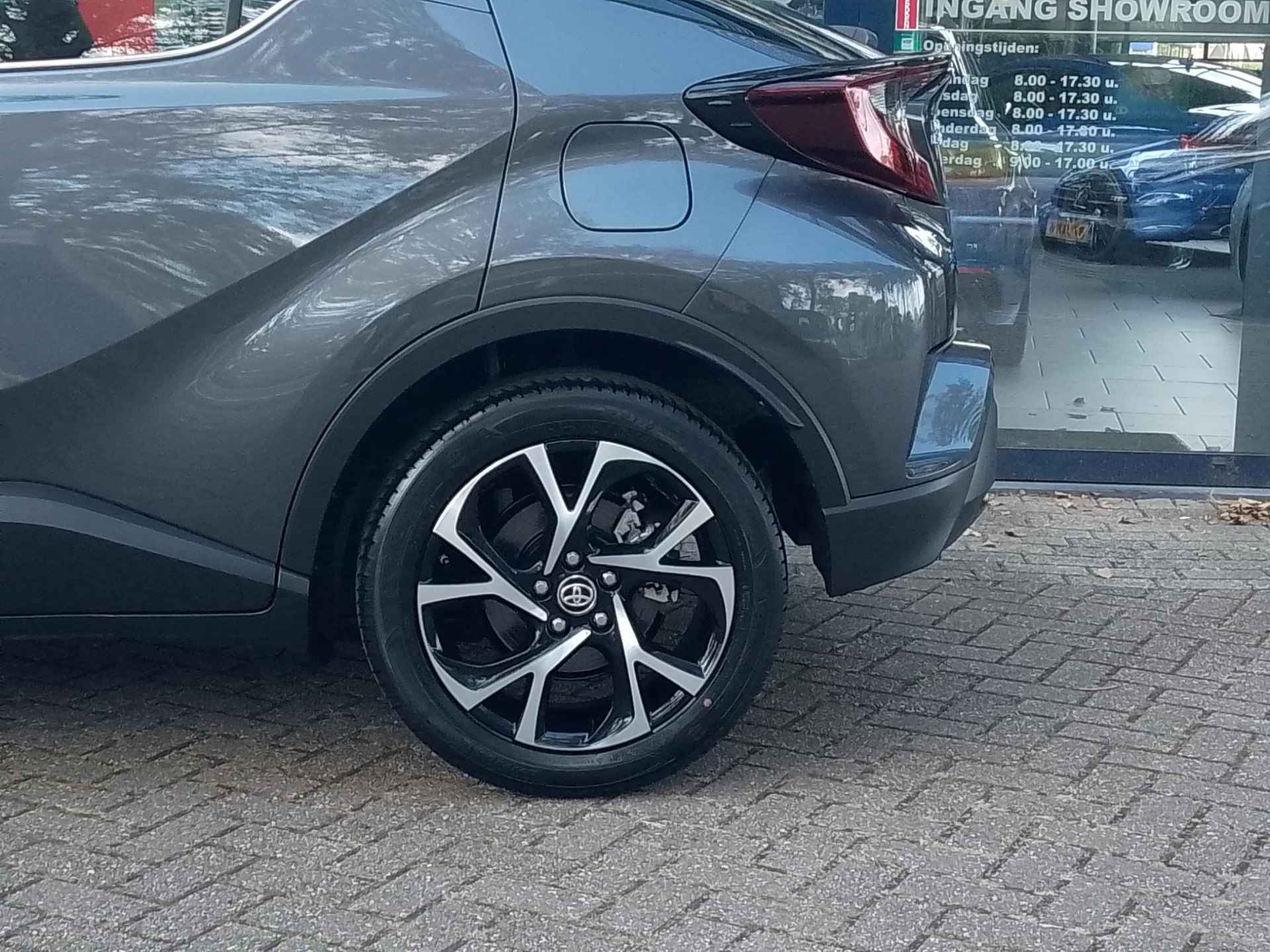 Toyota C-HR 1.8 Hybrid Dynamic | Navigatie | Climate Control | Parkeersensoren + Camera | Cruise Control | LM Velgen - 7/23