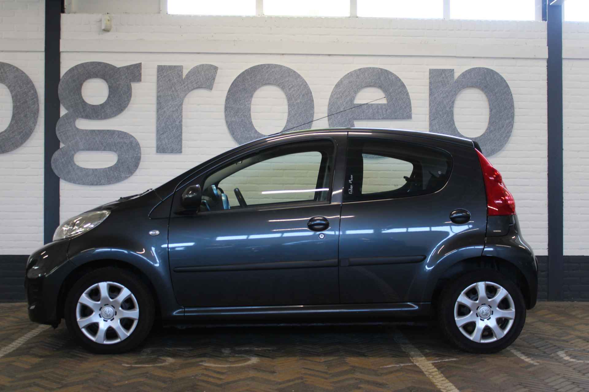 Peugeot 107 1.0-12V Urban Move | Incl. 12 maanden garantie | Airco | elektrische ramen | Toerenteller | Isofix | 1e eigenaar!! | - 11/26