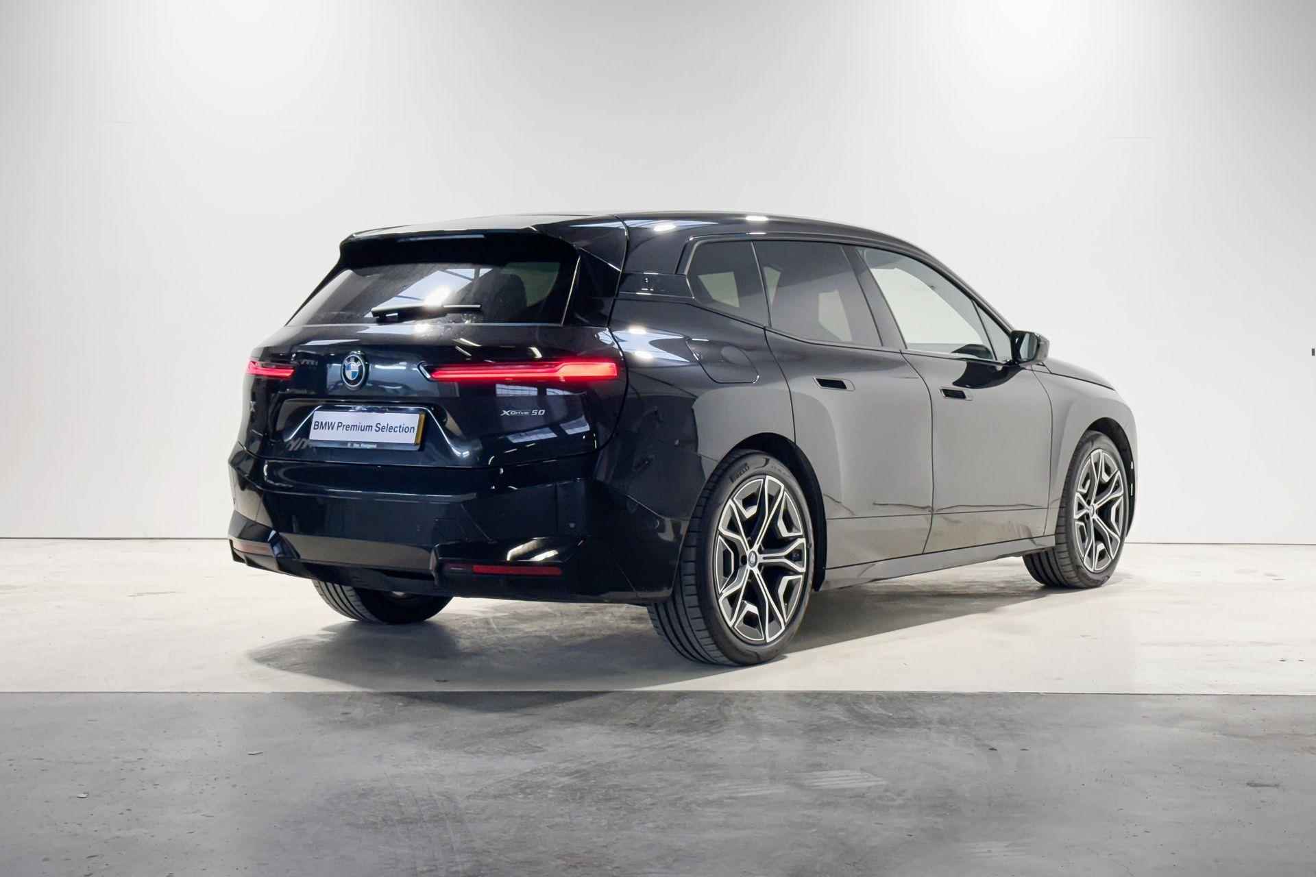 BMW iX xDrive50 Business Edition Plus Sportpakket - 6/24