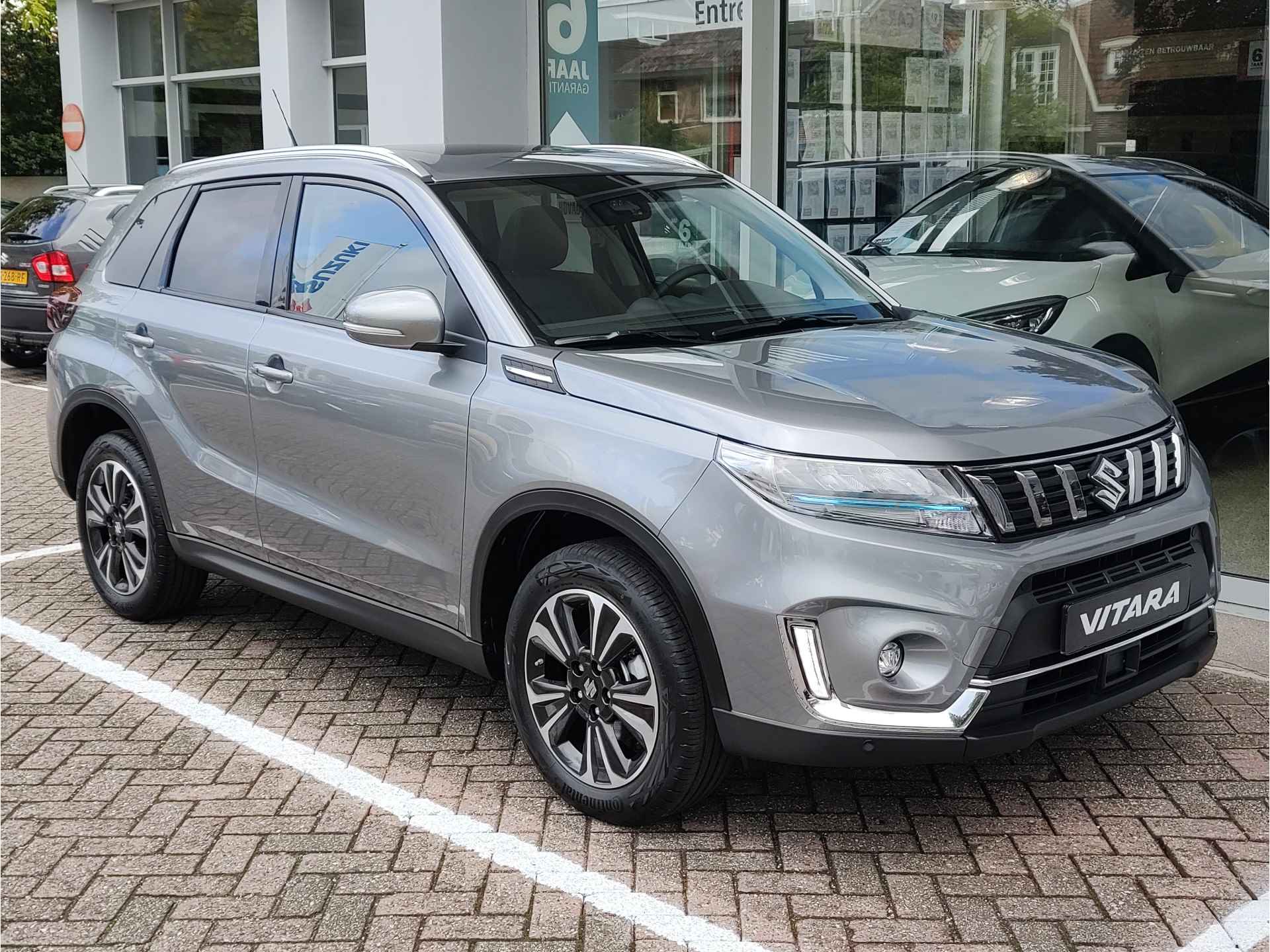 Suzuki Vitara 1.5 FULL HRYBID STYLE DIRECT LEVERBAAR! | Met 6 JAAR GARANTIE! | Inclusief € 3.500,- Voorraad Voordeel - 8/37