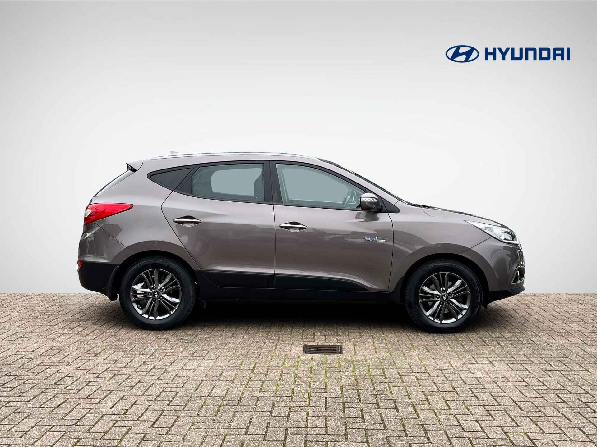 Hyundai ix35 1.6i GDI Go! | Trekhaak | Navigatie | Camera | Stoelverwarming | Cruise & Climate Control | ½ Leder | Bluetooth Tel. | Rijklaarprijs! - 3/30