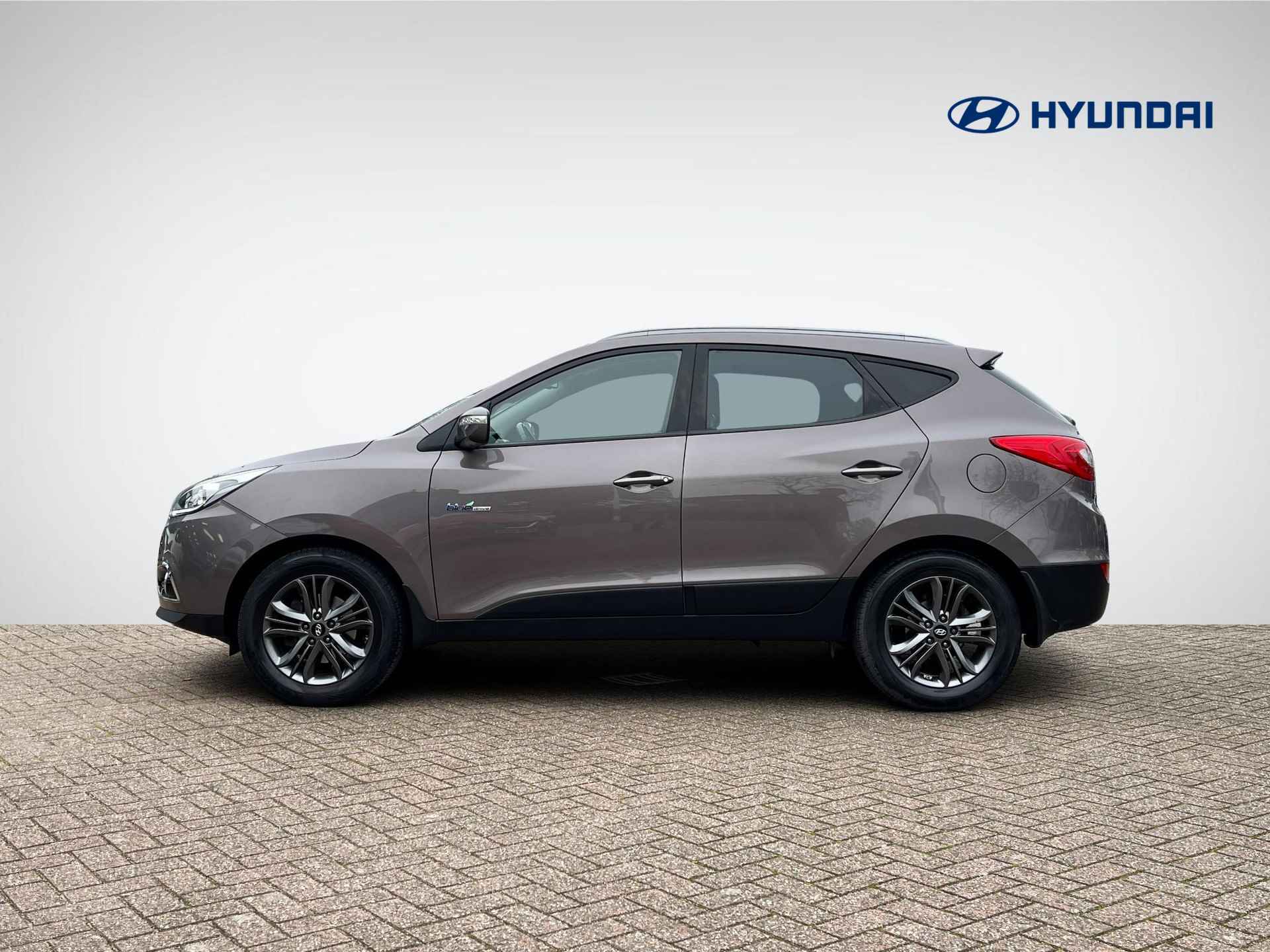 Hyundai ix35 1.6i GDI Go! | Trekhaak | Navigatie | Camera | Stoelverwarming | Cruise & Climate Control | ½ Leder | Bluetooth Tel. | Rijklaarprijs! - 7/30