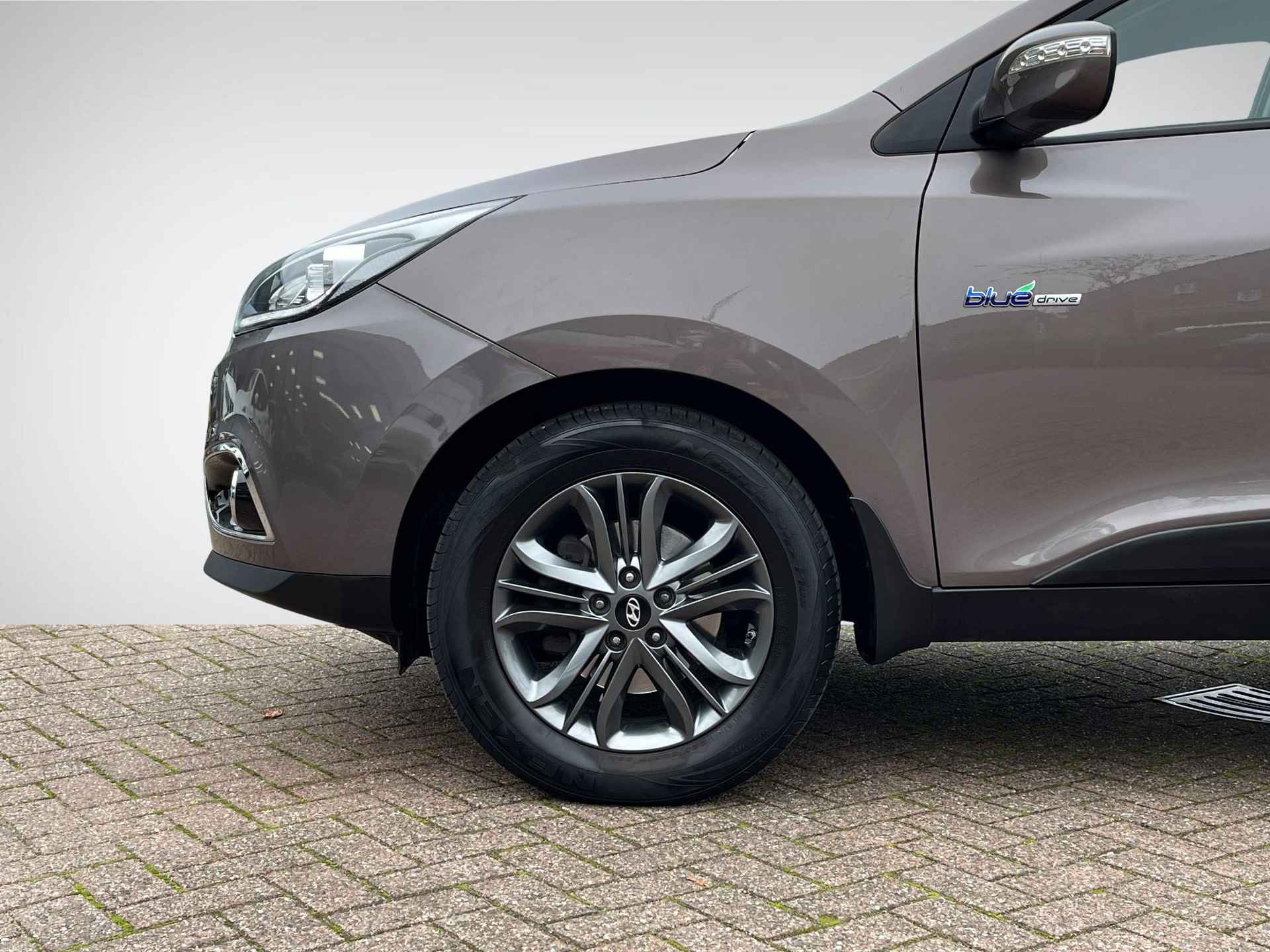 Hyundai ix35 1.6i GDI Go! | Trekhaak | Navigatie | Camera | Stoelverwarming | Cruise & Climate Control | ½ Leder | Bluetooth Tel. | Rijklaarprijs! - 8/30