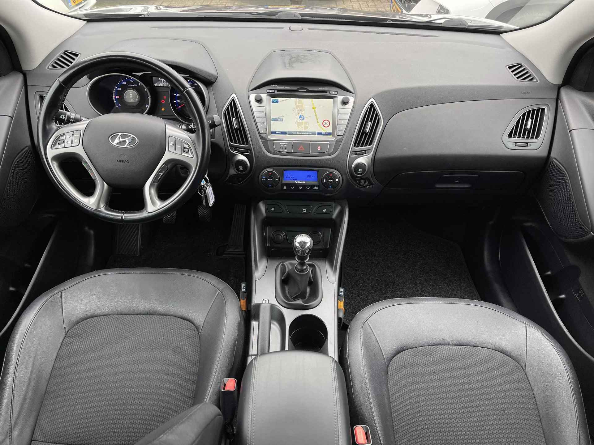 Hyundai ix35 1.6i GDI Go! | Trekhaak | Navigatie | Camera | Stoelverwarming | Cruise & Climate Control | ½ Leder | Bluetooth Tel. | Rijklaarprijs! - 13/30