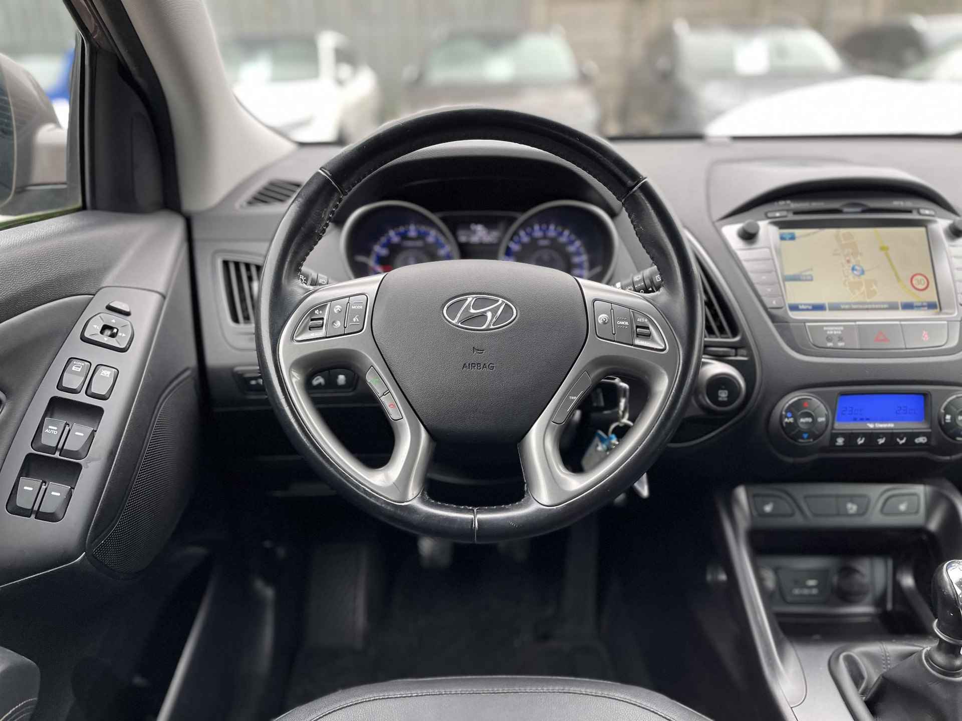 Hyundai ix35 1.6i GDI Go! | Trekhaak | Navigatie | Camera | Stoelverwarming | Cruise & Climate Control | ½ Leder | Bluetooth Tel. | Rijklaarprijs! - 14/30