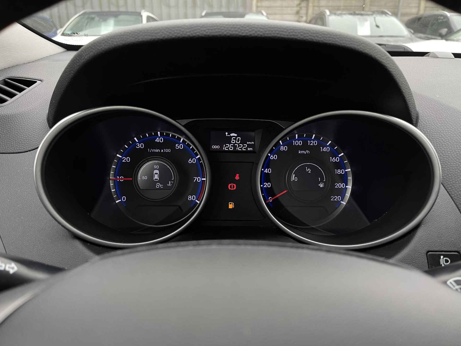 Hyundai ix35 1.6i GDI Go! | Trekhaak | Navigatie | Camera | Stoelverwarming | Cruise & Climate Control | ½ Leder | Bluetooth Tel. | Rijklaarprijs! - 29/30