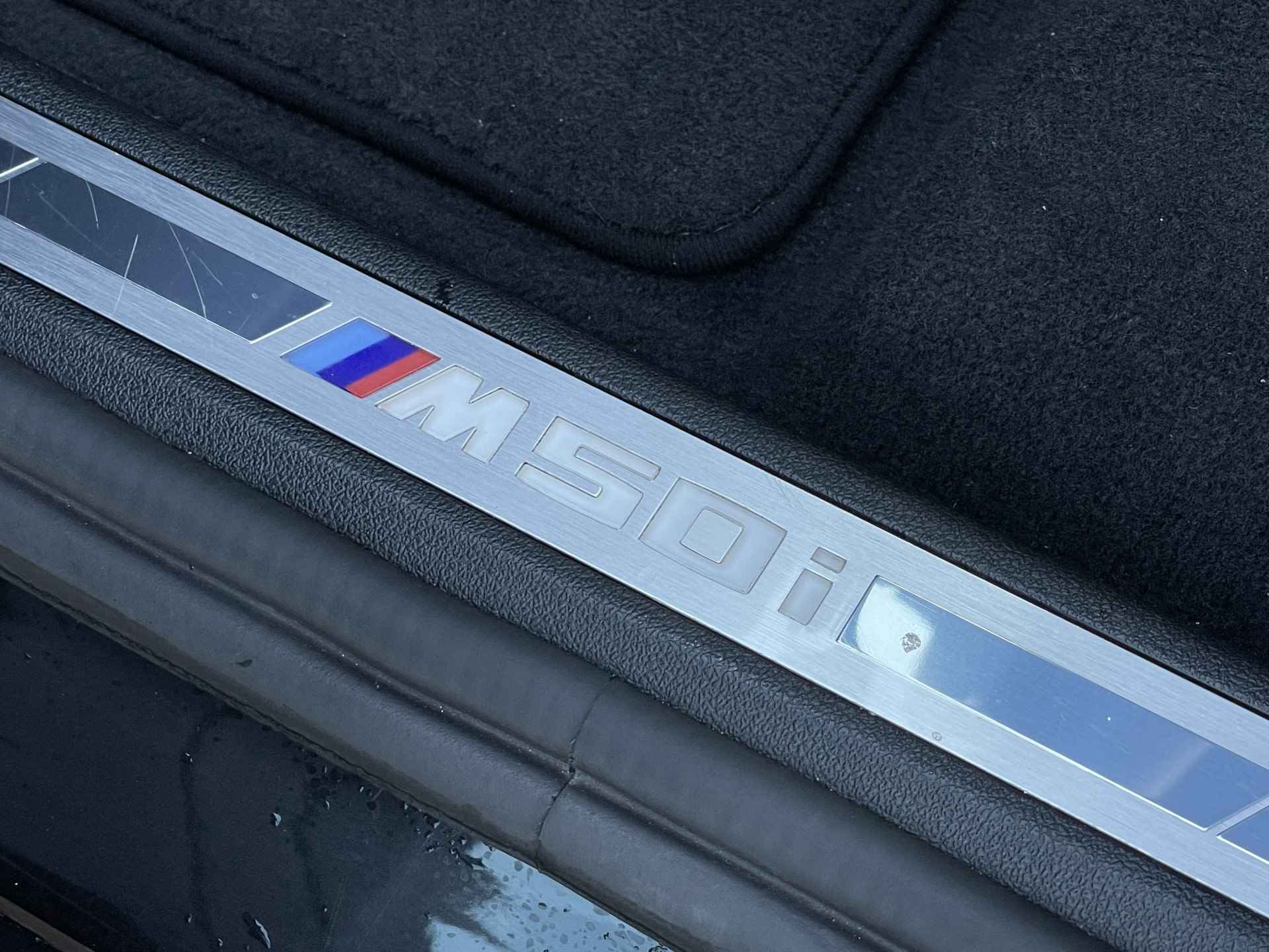 BMW X7 M50i High Exe | Individual leder | Standkachel | Trekhaak | Stoelmassage + verwarming + ventilatie | Skylounge | Alcantara hemel - 15/52