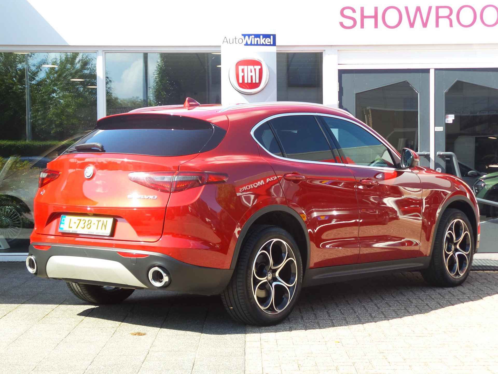 Alfa Romeo Stelvio 2.0 Turbo Aut. AWD 280pk Super | Veloce Int. Pack | Adapt. Cruise | Xenon | Dakrails | Apple Carplay | BSM | Achterbank Verwarming | Rosso Comp. - 2/30