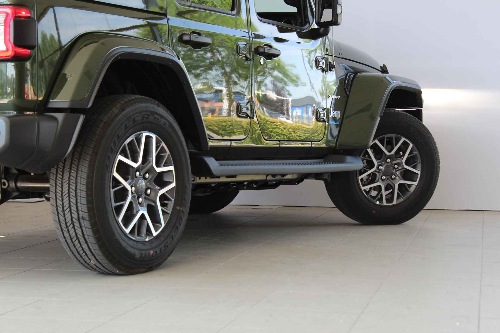 Jeep Wrangler Unlimited 4xe 380 Sahara | Leder | Camera V+A | Carplay | Navigatie - 37/46