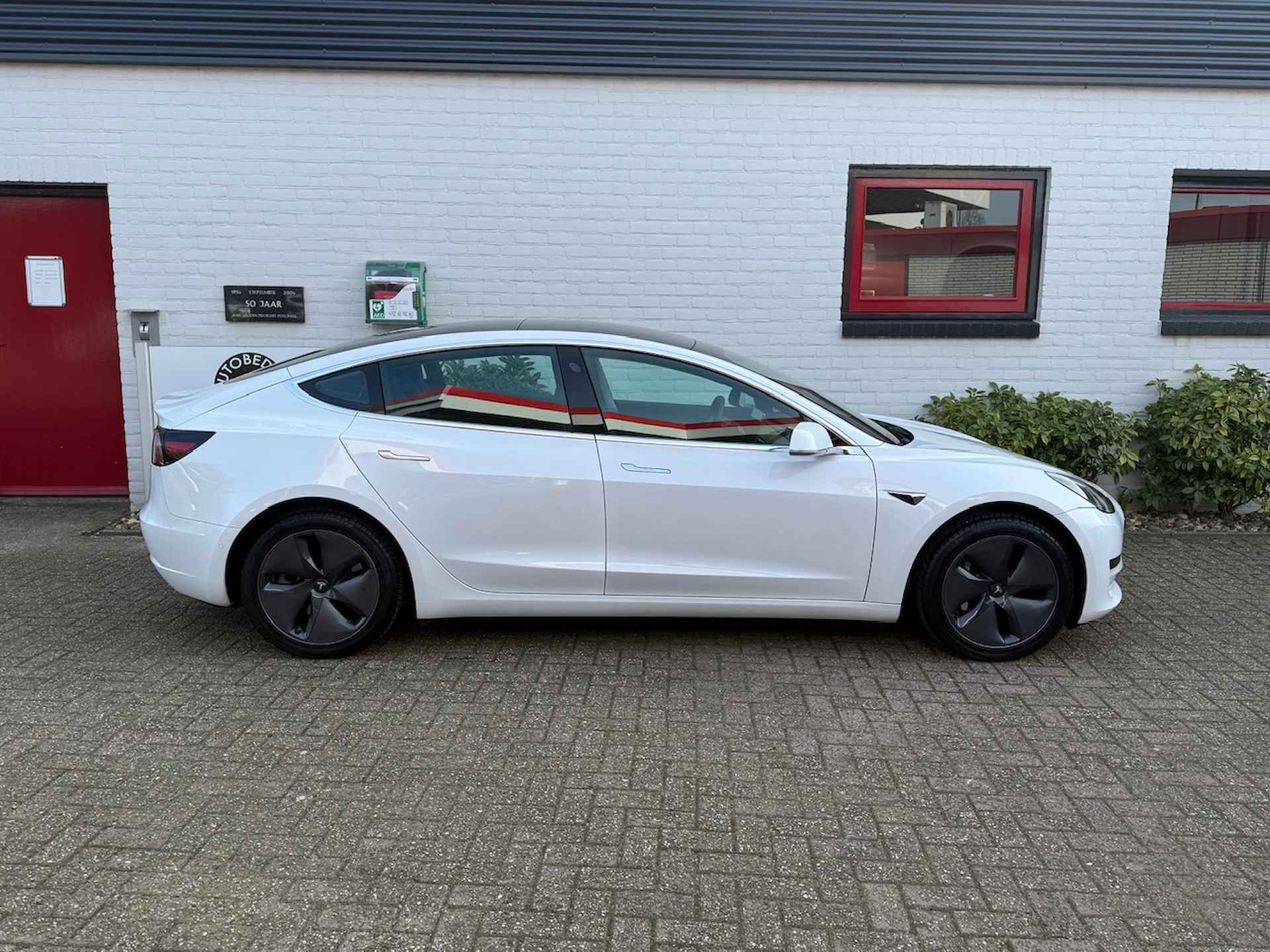 Tesla Model 3 Standard Plus RWD/ LFP accu/ Parelmoer wit/ Camera achter/ Lederen bekleding/ Stoelverwarming/ 1 Eigenaar/ Origineel NL/ NAP - 4/32