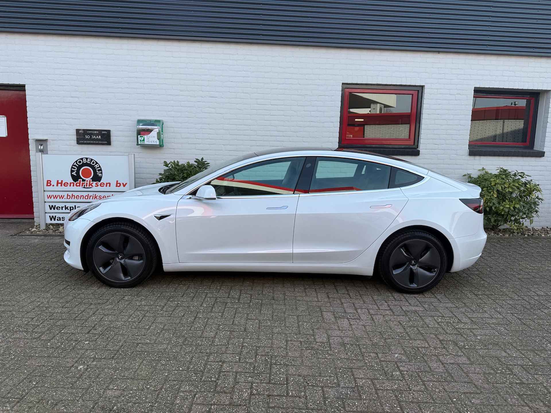 Tesla Model 3 Standard Plus RWD/ LFP accu/ Parelmoer wit/ Camera achter/ Lederen bekleding/ Stoelverwarming/ 1 Eigenaar/ Origineel NL/ NAP - 5/32