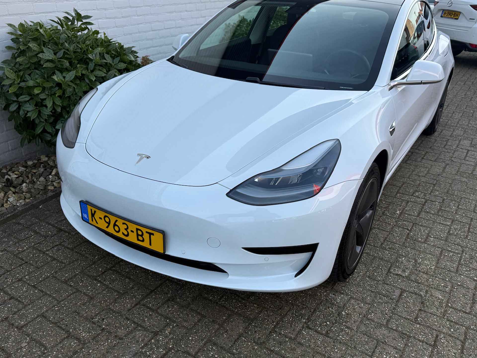 Tesla Model 3 Standard Plus RWD/ LFP accu/ Parelmoer wit/ Camera achter/ Lederen bekleding/ Stoelverwarming/ 1 Eigenaar/ Origineel NL/ NAP - 27/32