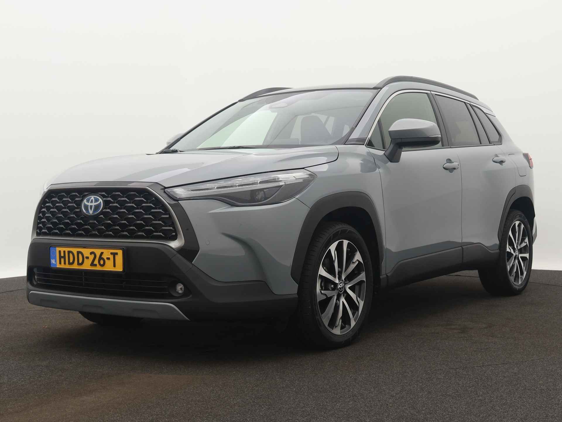 Toyota Corolla Cross Hybrid 140 Style + Premium Pack I Limited | Panoramadak | Dodehoek Ass. | LM velgen | Stoelverwarming | Draadloze telefoonlader | Half leder | - 14/47