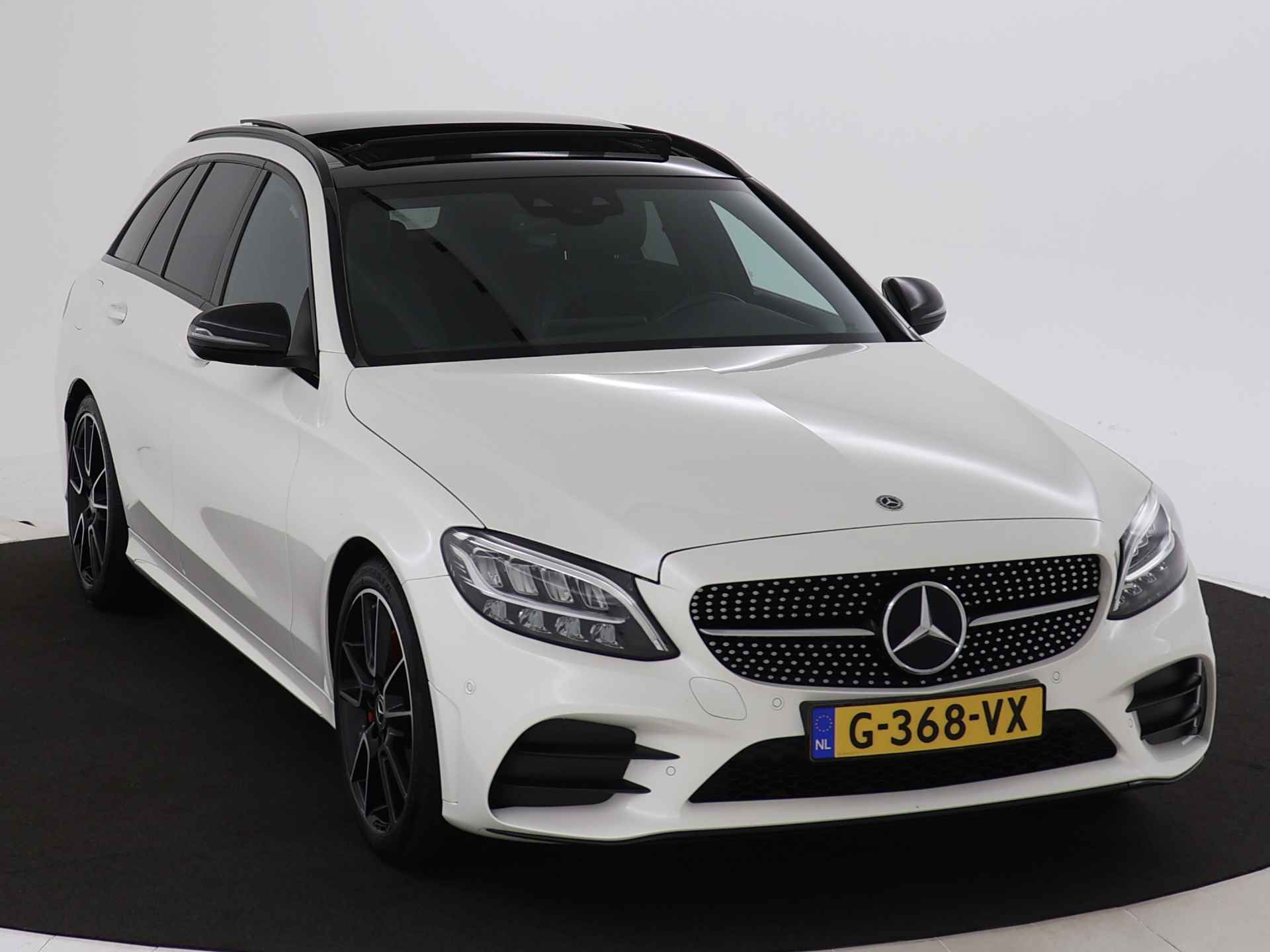 Mercedes-Benz C-Klasse Estate 180 AMG-line | Panoramadak | Burmeister audio | 19 inch. LM velgen | Parking support met camera achter | Navigatie | Inclusief 24 maanden MB Certified garantie voor Europa. - 29/43