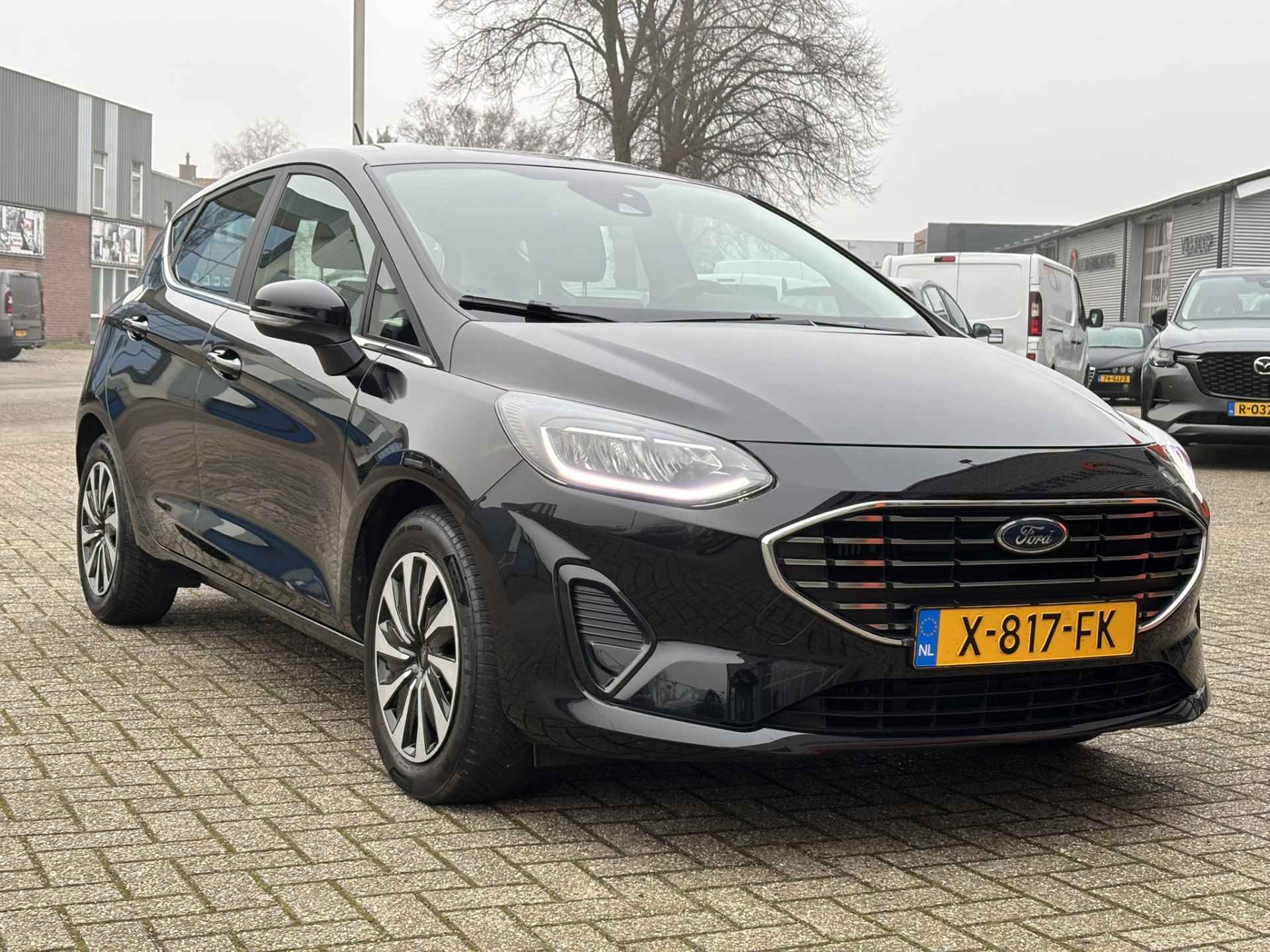 Ford Fiesta 1.0 EcoBoost Hybrid Titanium / Sensoren Achter / AndroidAuto/AppleCarplay / Stoel/Stuurverwarming / Verwarmbare Voorruit / - 27/35