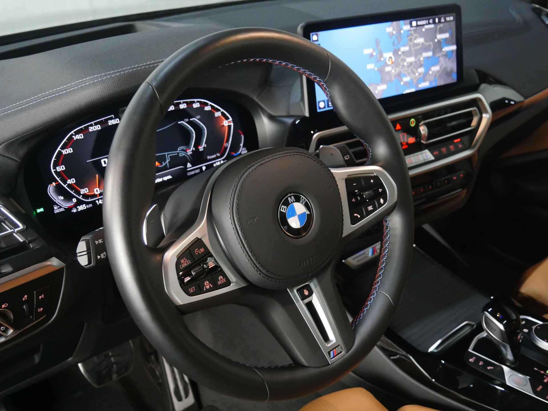 BMW X3 M40d xDrive High Executive Automaat / BMW M 50 Jahre uitvoering / Panoramadak / Laserlight / Trekhaak / M Sportstoelen / Adaptief M Onderstel / Parking Assistant Plus - 19/42