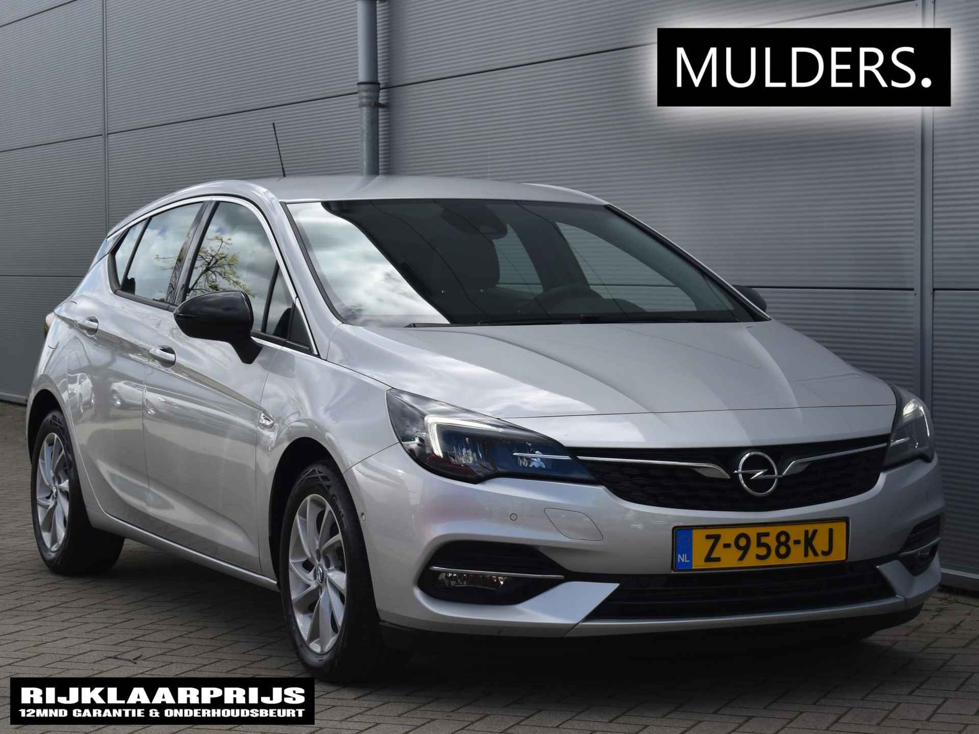 Opel Astra 1.2 turbo 130 pk Blitz Elegance / navi / camera / blis / ecc airco - 1/34