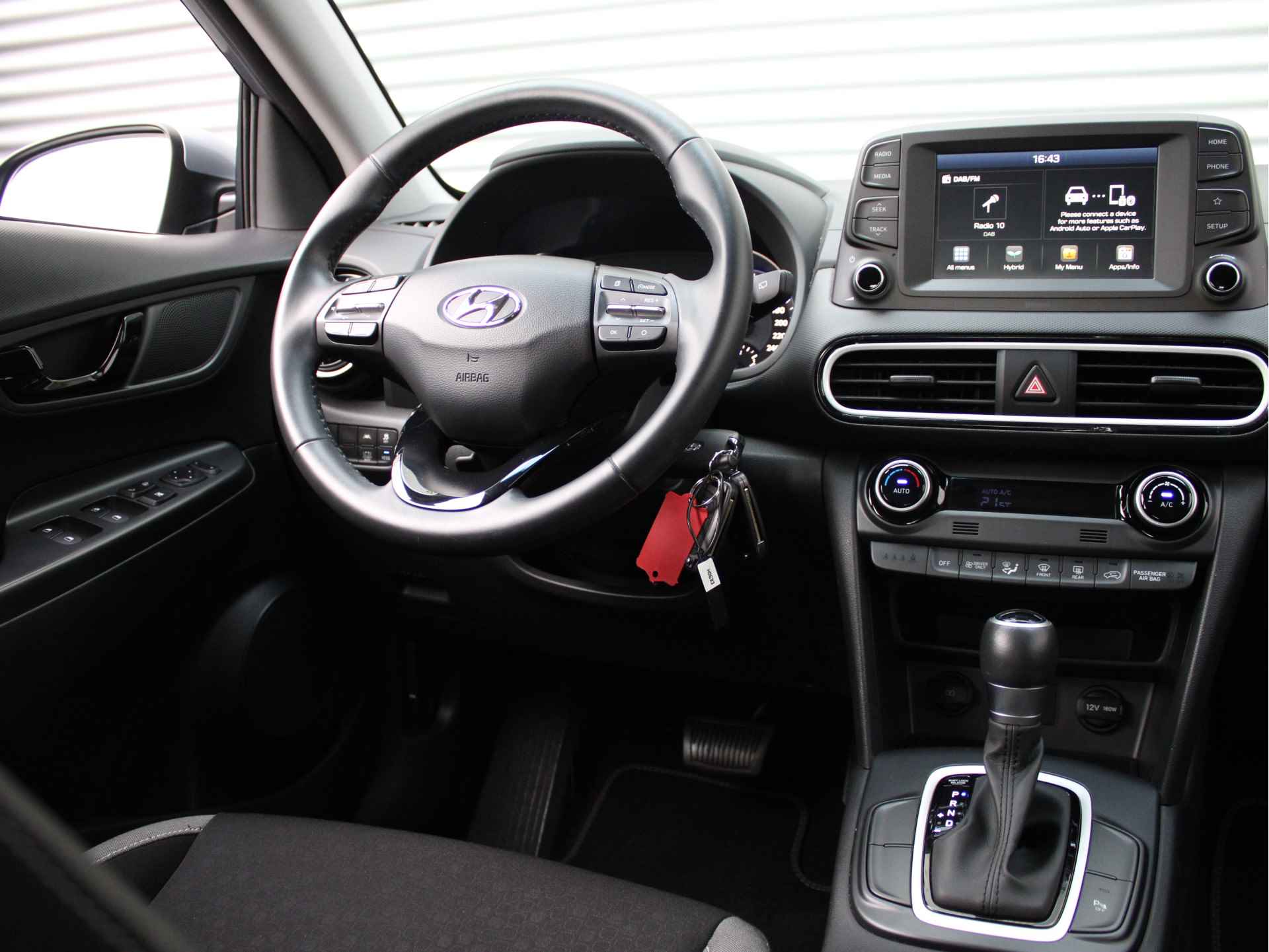 Hyundai KONA 1.6 GDI HEV Comfort 140pk Automaat | Navigatie by App | Parkeercamera | Cruise Control | Climate Control | Armsteun | Regensenso - 6/28