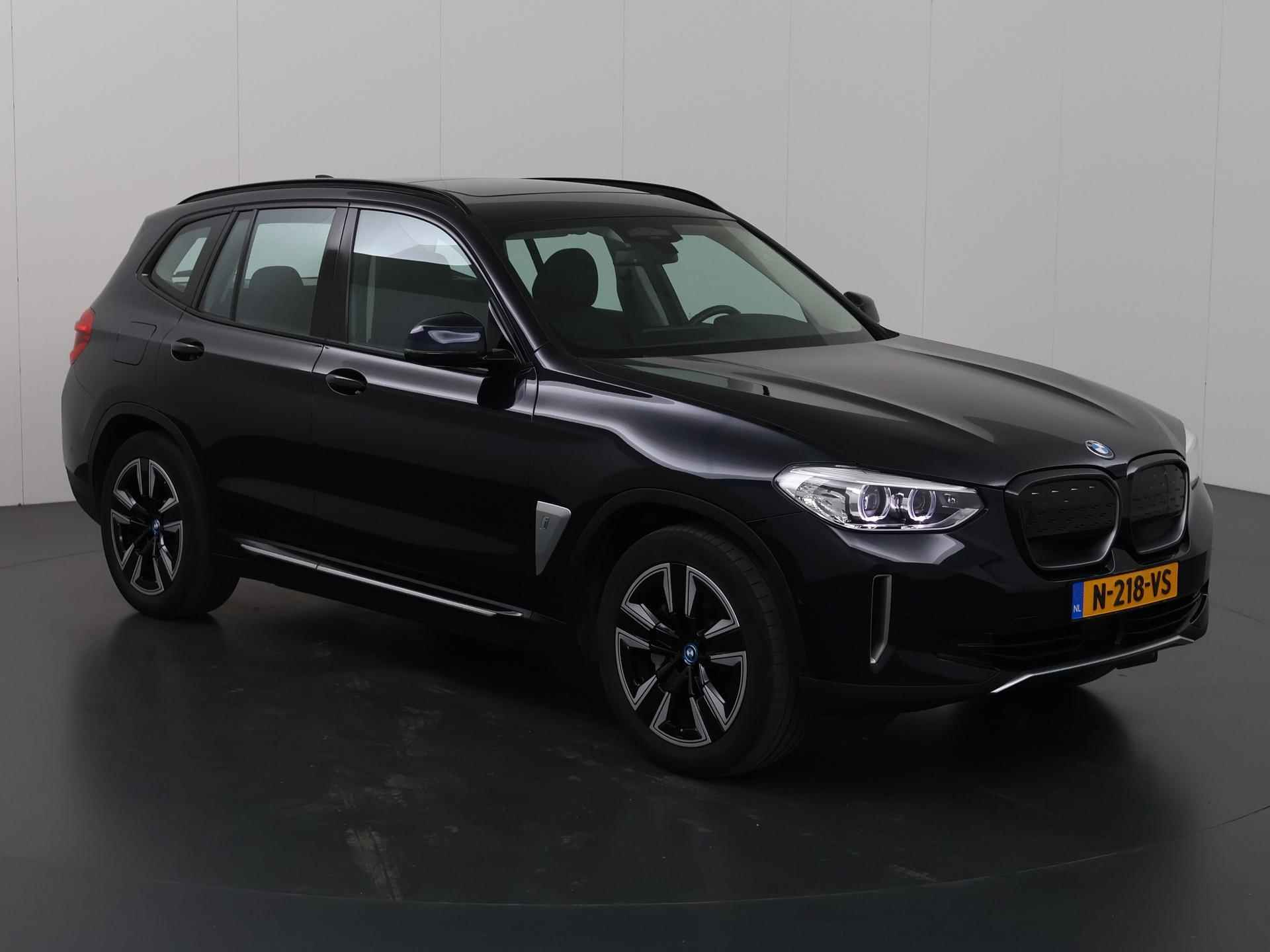 BMW iX3 Executive 80 kWh | Elektrisch verstelbare stoelen + geheugen | Digitaal Dashboard | Camera | Apple CarPlay | Navigatie | Stoelverwarming | Standkachel | Panoramadak | Adaptieve Cruise Control | Trekhaak | - 24/49