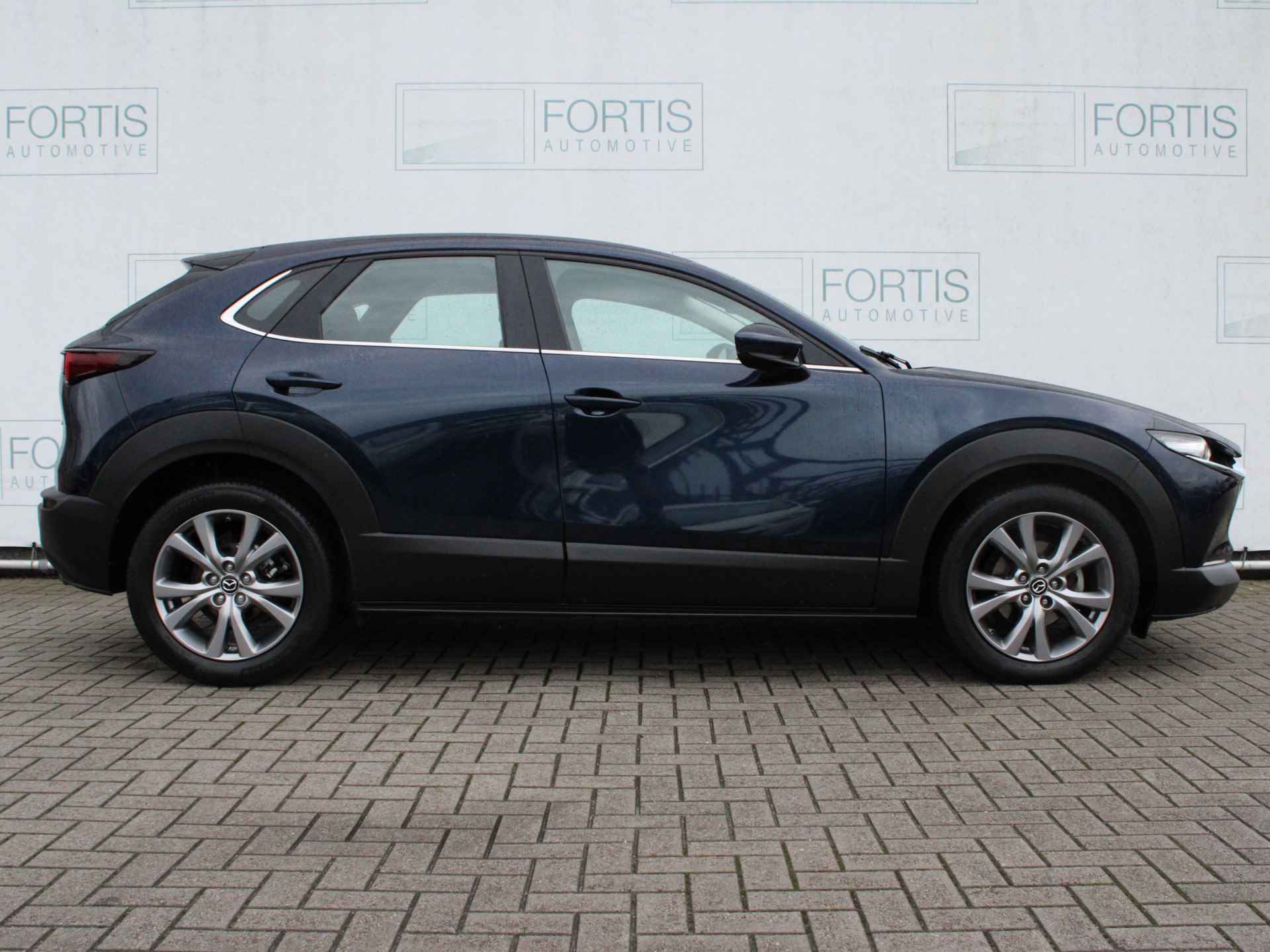 Mazda CX-30 2.0 e-SkyActiv-X M Hybrid Comfort NL AUTO | CAMERA | STUURWIEL VERW | STOELVERW | TREKHAAK | - 12/28