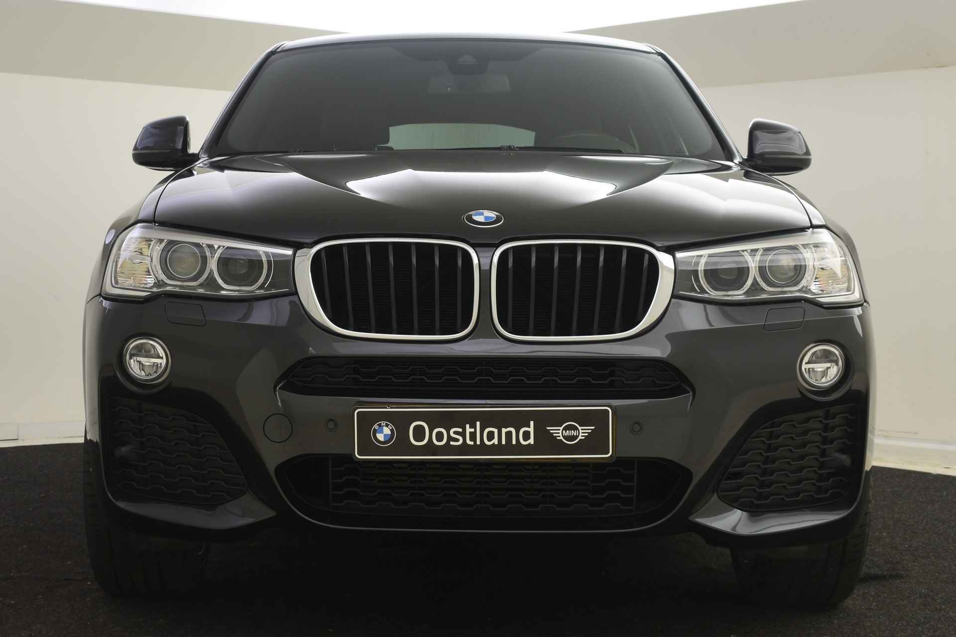 BMW X4 xDrive20d High Executive M Sport Automaat / Trekhaak / Sportstoelen / Stoelverwarming / Achteruitrijcamera / Xenon / Cruise Control / Navigatie Professional - 23/39