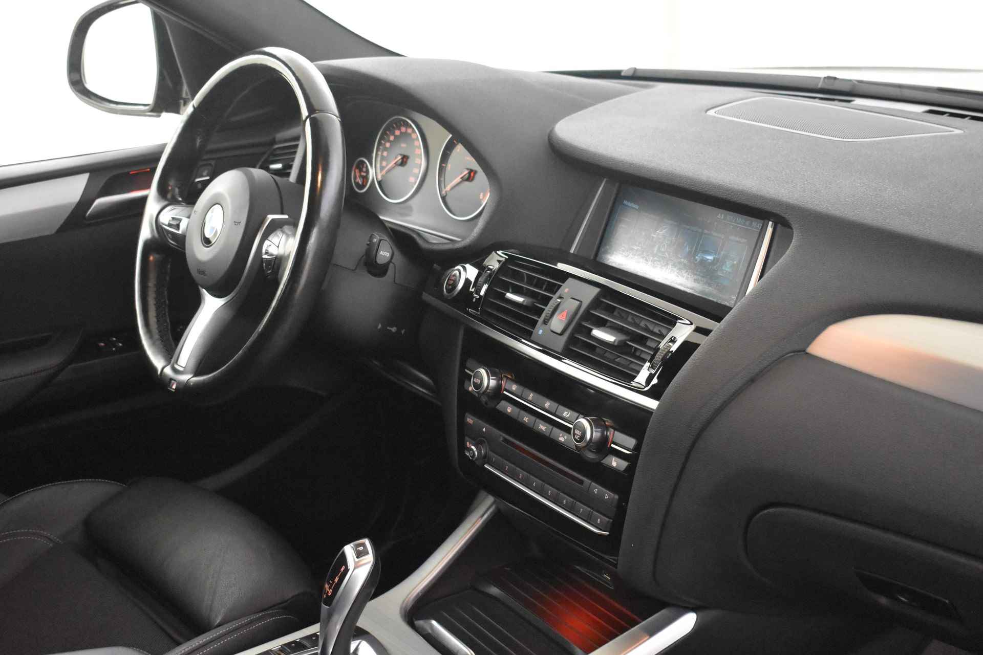 BMW X4 xDrive20d High Executive M Sport Automaat / Trekhaak / Sportstoelen / Stoelverwarming / Achteruitrijcamera / Xenon / Cruise Control / Navigatie Professional - 26/39