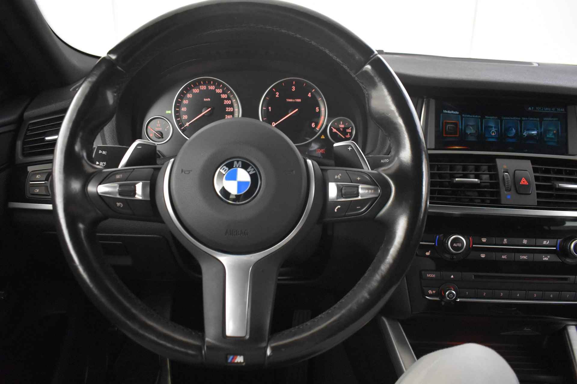 BMW X4 xDrive20d High Executive M Sport Automaat / Trekhaak / Sportstoelen / Stoelverwarming / Achteruitrijcamera / Xenon / Cruise Control / Navigatie Professional - 27/39