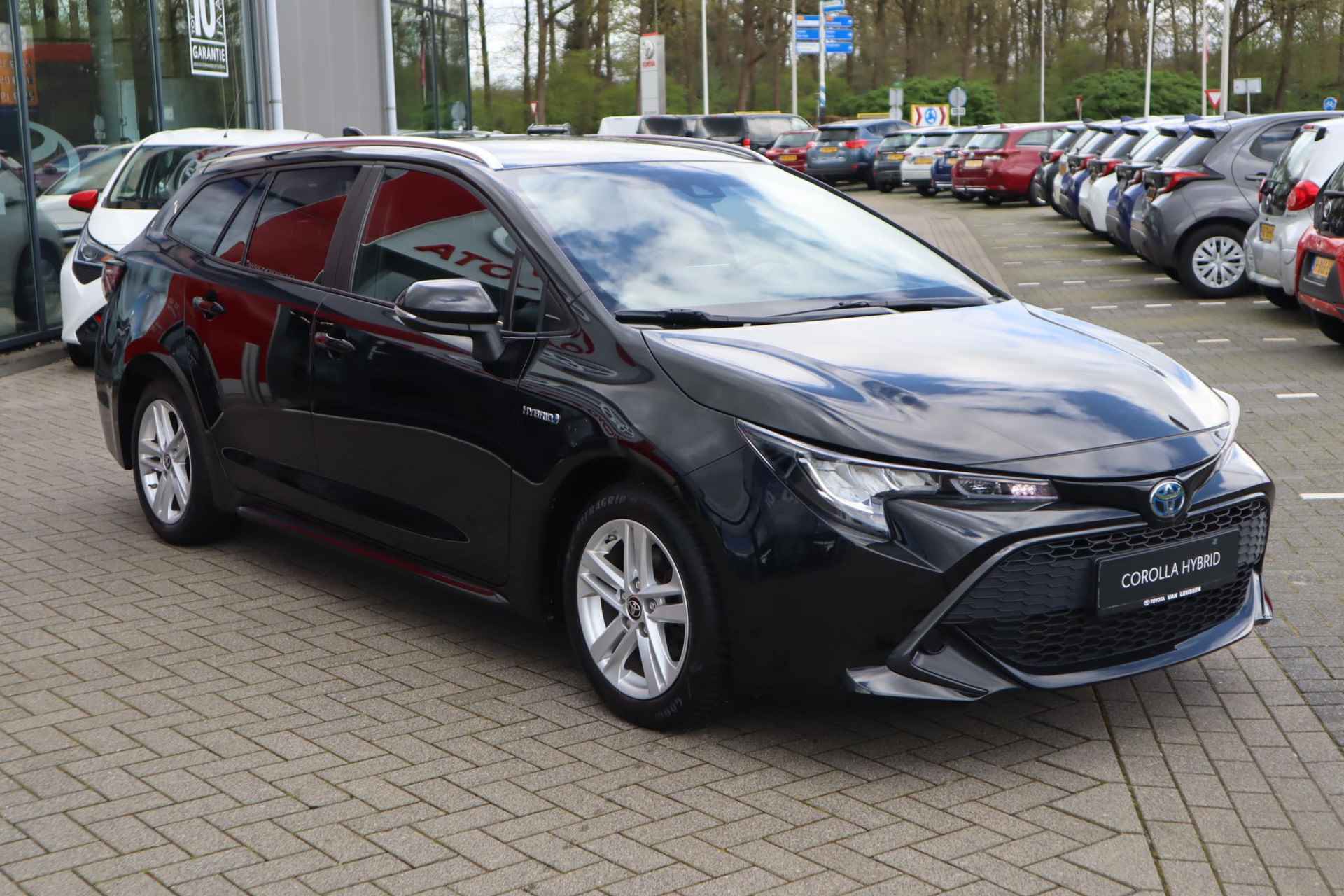 Toyota Corolla Touring Sports 1.8 Hybrid Dynamic APPLE/ANDROID STOEL/STUURVERW. CAMERA AD-CRUISE PRIVACY-GLASS LM-VELGEN - 26/31