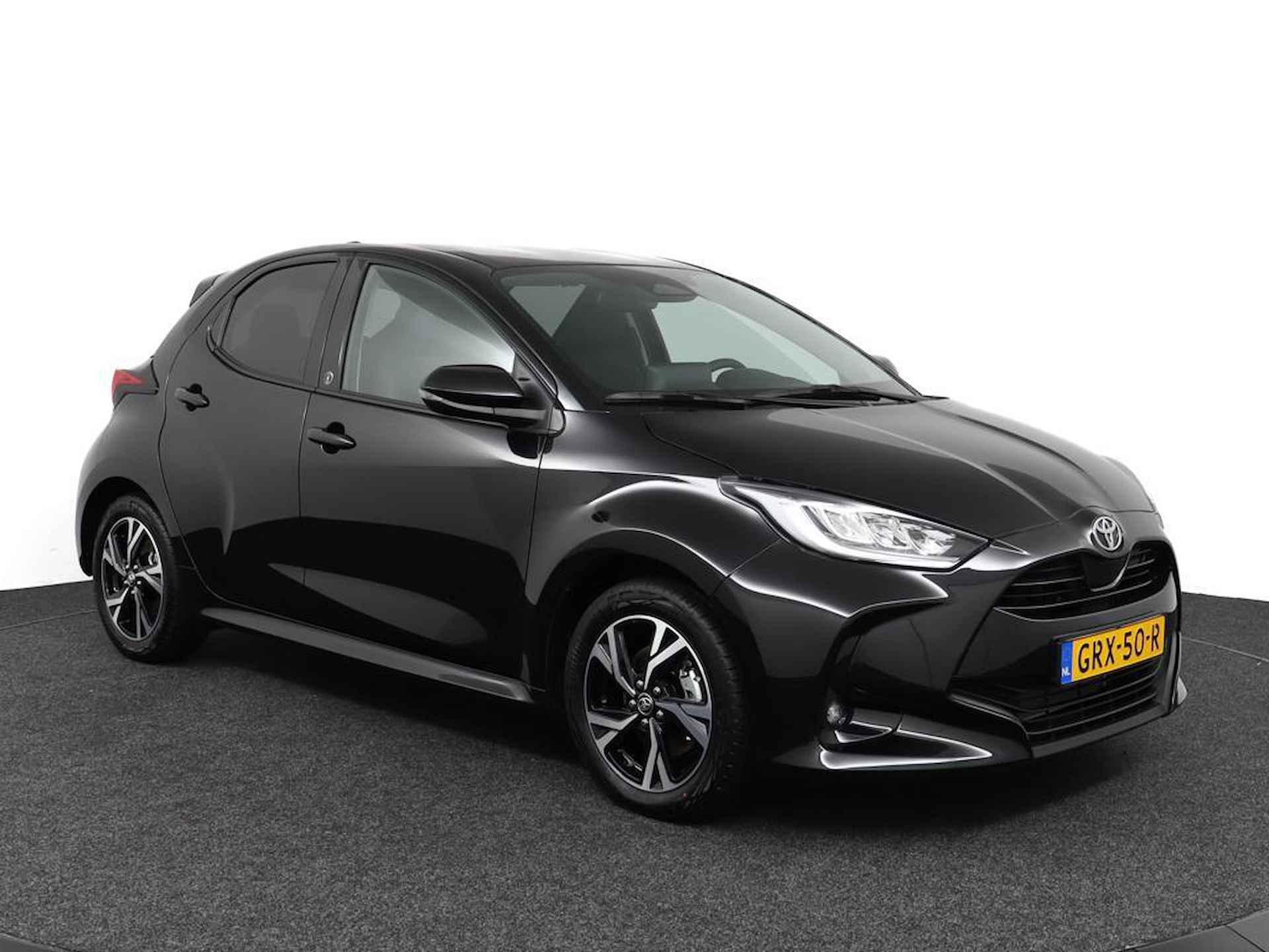 Toyota Yaris 1.5 Hybrid 115 First Edition | Winterpakket | Apple Carplay | Android Auto | Draadloze telefoonlader | 10 Jaar Garantie | - 14/42