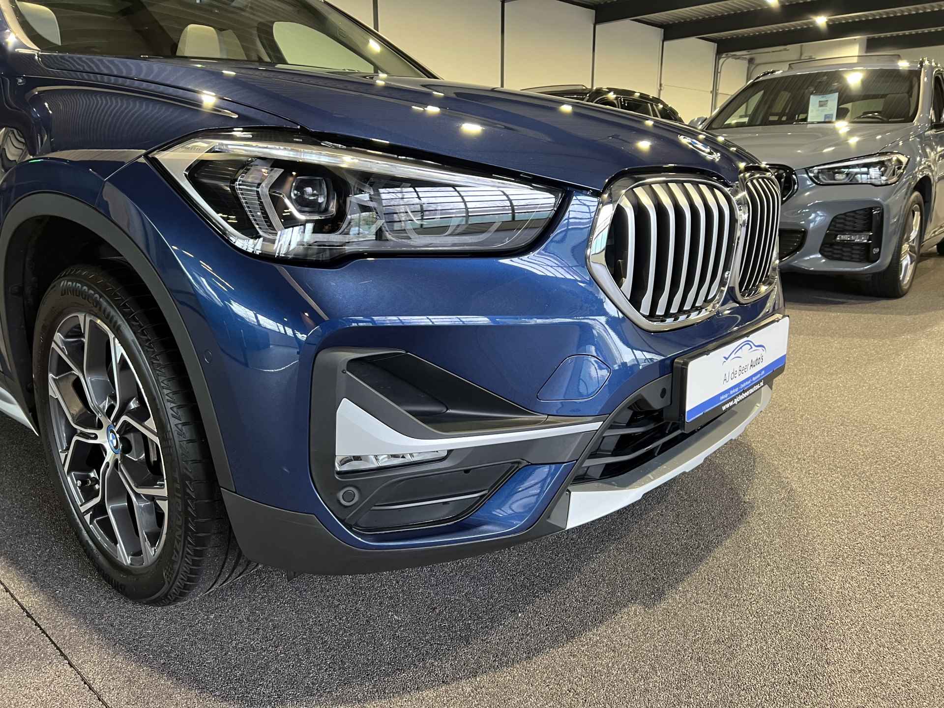 BMW X1 xDrive25e Executive Panorama | Beige leder | HUD | Trekhaak | Camera - 20/45