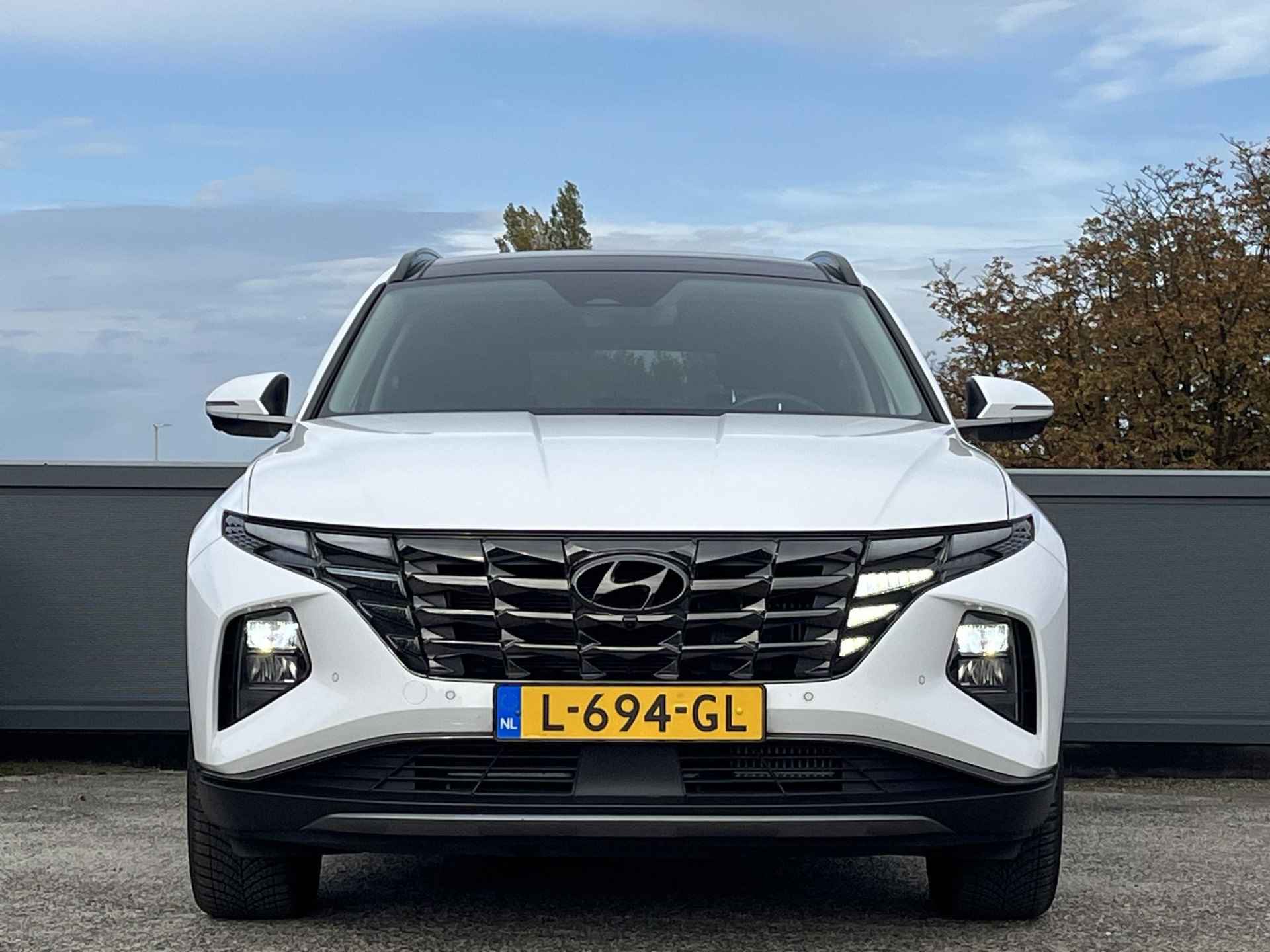 Hyundai Tucson 1.6 T-GDI HEV Premium Sky | Schuifkanteldak | Lederen bekleding | Navigatie & Camera | Blind-spot View Monitor | - 4/58