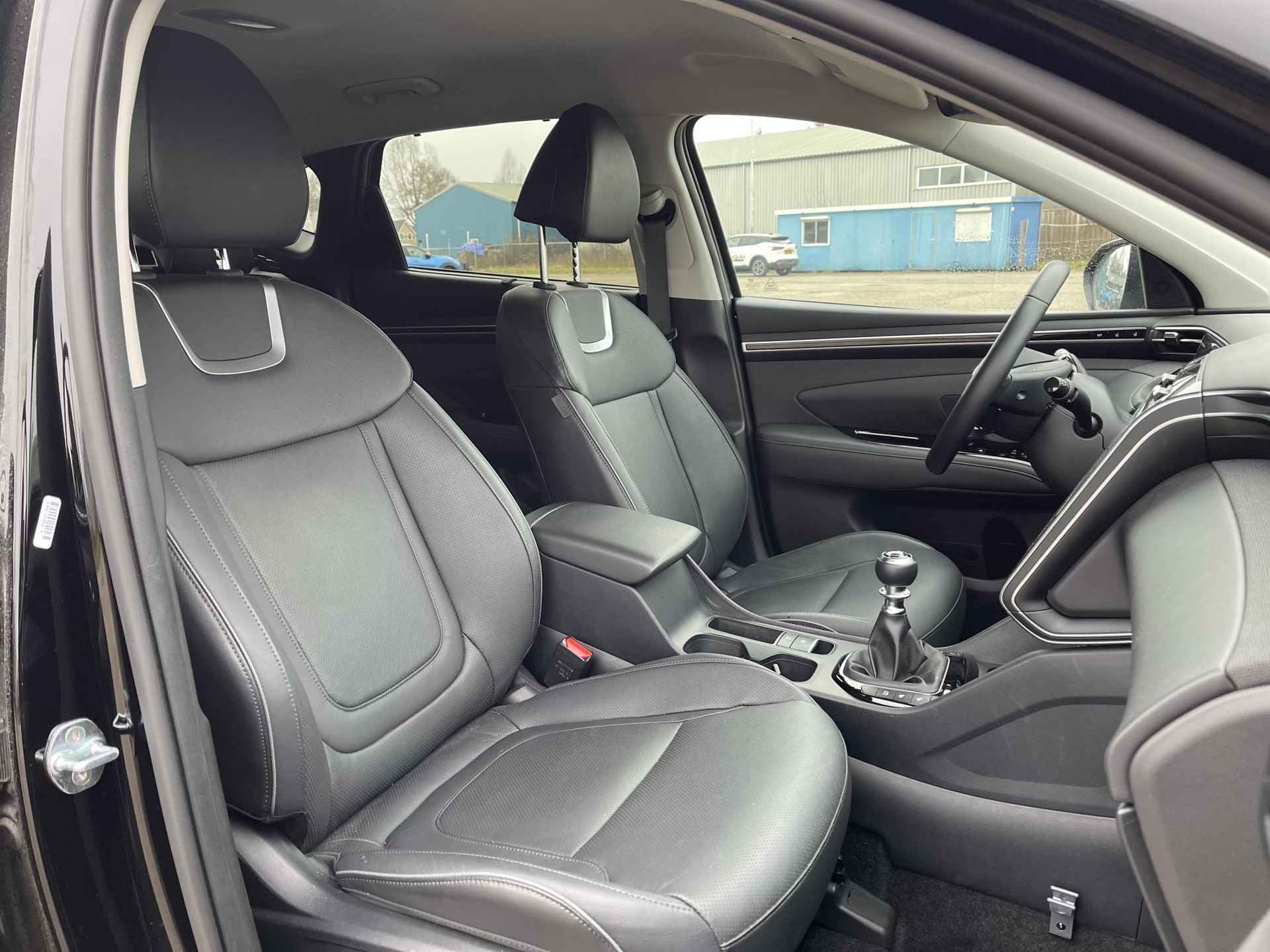 Hyundai Tucson 1.6 T-GDI MHEV Premium | Vol-Leder | Digitaal Instrumentenpaneel | Adapt. Cruise Control | Apple Carplay/Android Auto | Stoelverwarming | Dodehoek Detectie | 360° Camera | Rijklaarprijs! - 11/29