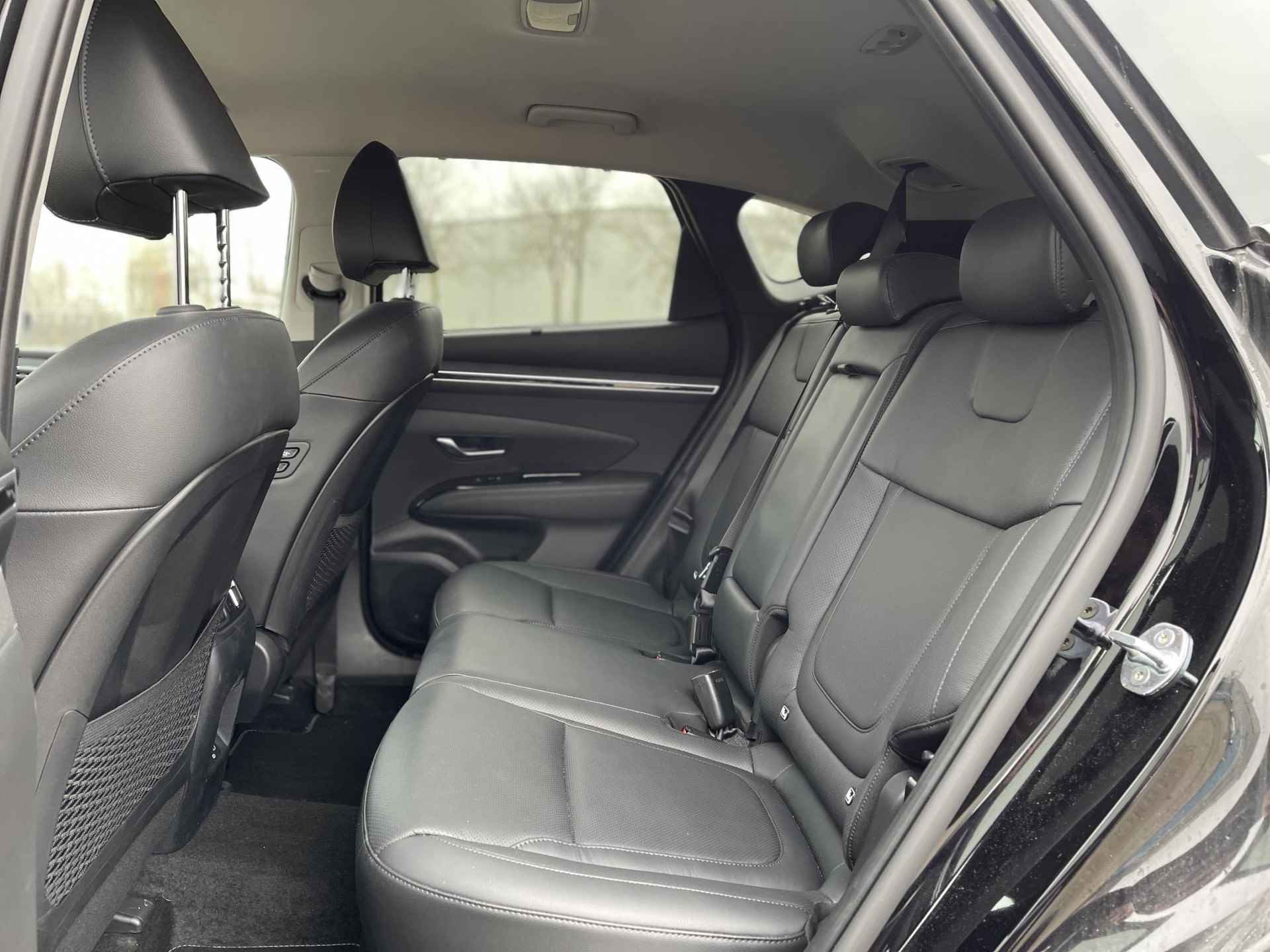 Hyundai Tucson 1.6 T-GDI MHEV Premium | Vol-Leder | Digitaal Instrumentenpaneel | Adapt. Cruise Control | Apple Carplay/Android Auto | Stoelverwarming | Dodehoek Detectie | 360° Camera | Rijklaarprijs! - 12/29