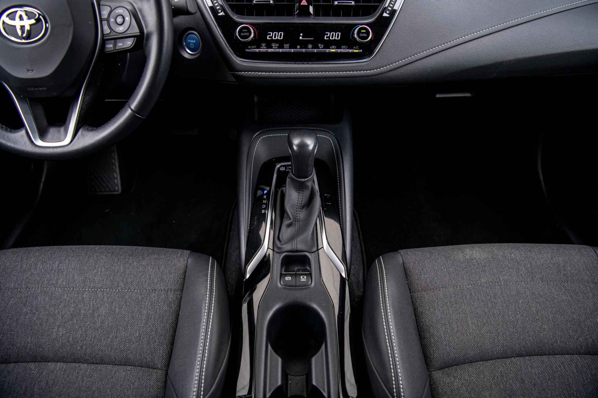 Toyota Corolla 1.8 98pk Hybrid Dynamic | Automaat | Adaptieve Cruise Control | Airco/Clima | Camera | Navi | 17" LM Velgen - 32/48