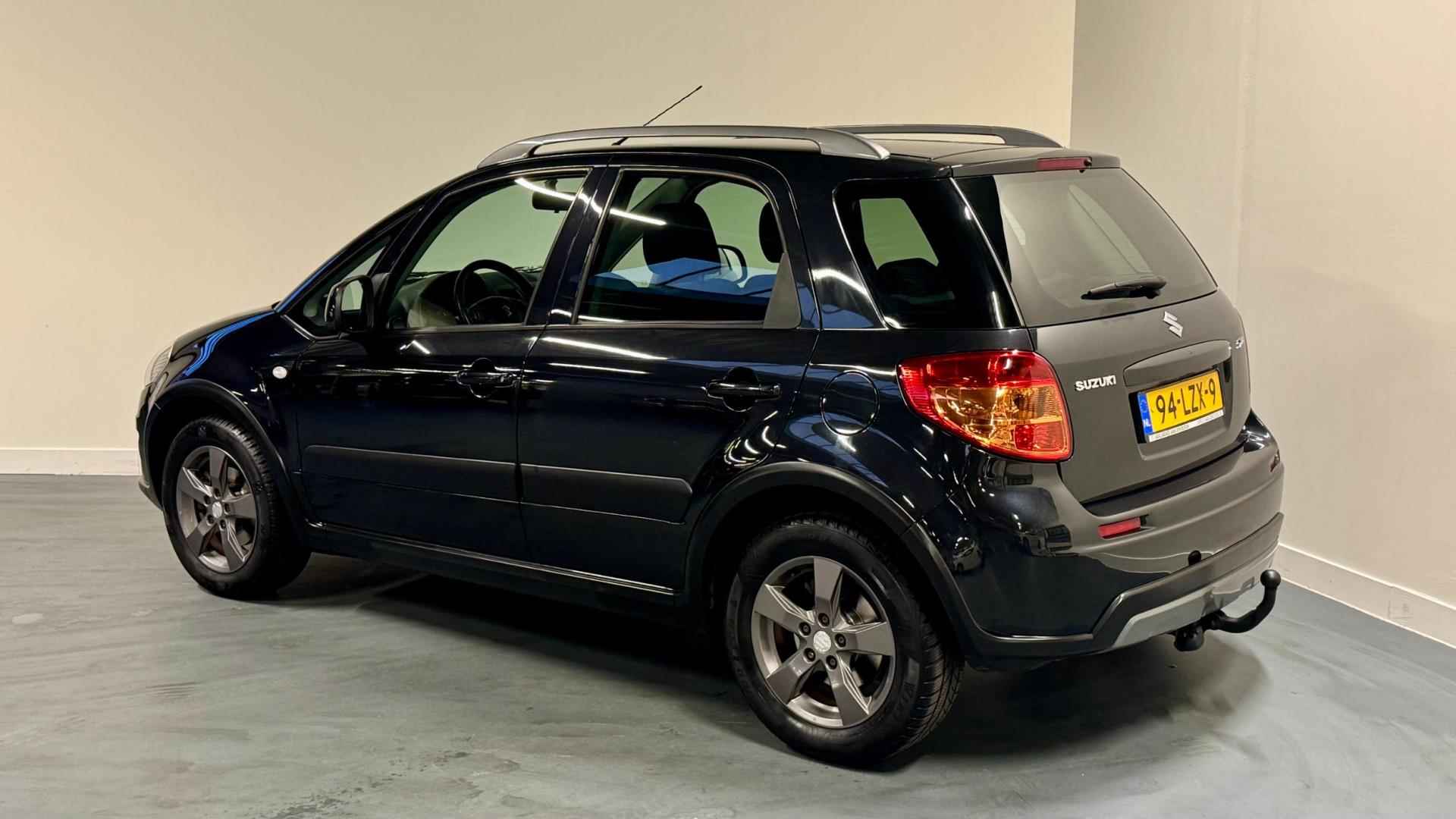 Suzuki SX4 1.6 Limited | NL-AUTO | 1E EIGENAAR | TREKHAAK | PARROT | - 10/30