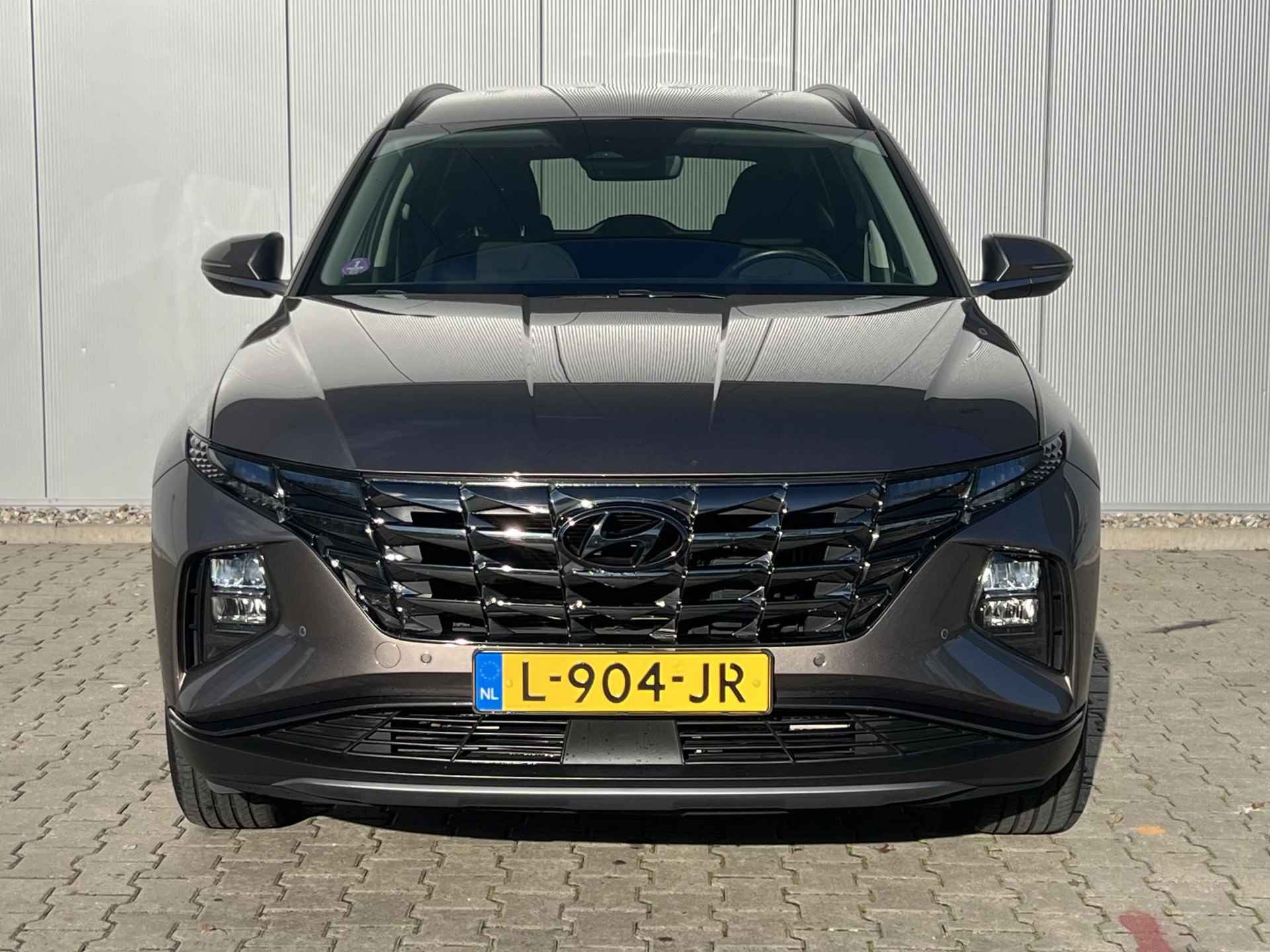 Hyundai Tucson 1.6 T-GDI HEV Comfort / Stoelverwarming / Apple Carplay & Android Auto /  Achteruitrijcamera / Trekhaak / Navigatie / - 26/28