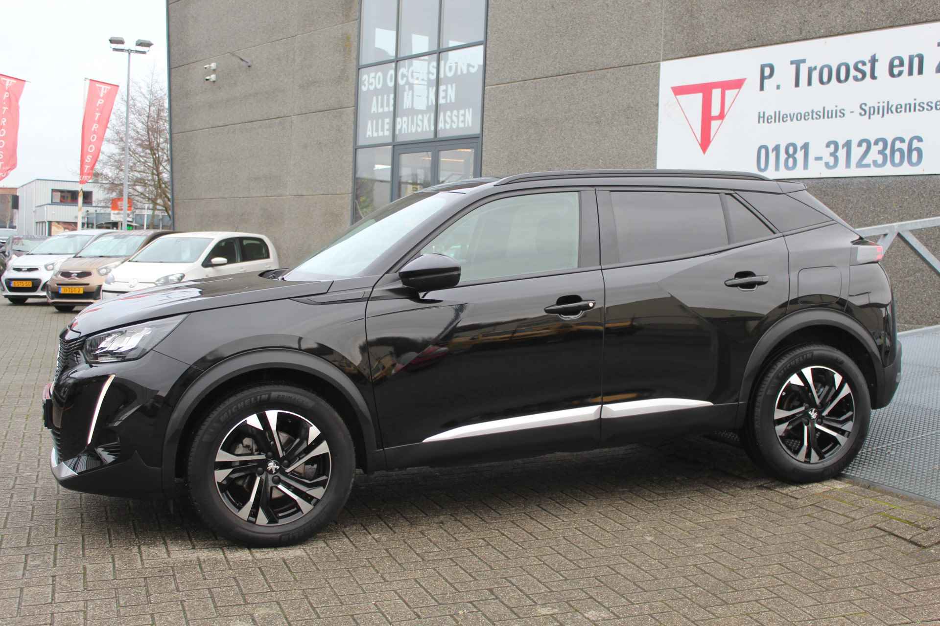 Peugeot 2008 1.2 PureTech Allure Pack Apple Carplay/Navigatie/3D-Cockpit/360 Camera/Achteruitrijcamera/Origineel NL - 4/26