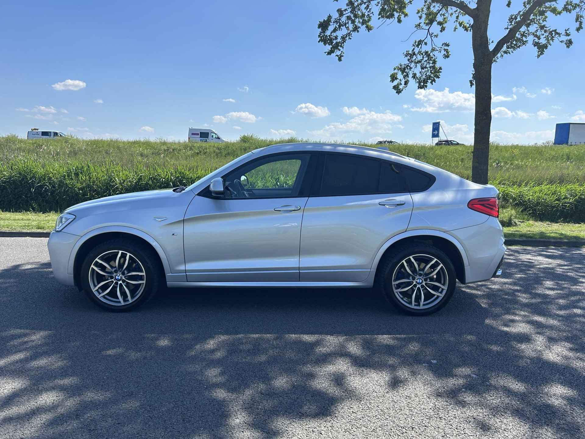 BMW X4 xDrive30d High Executive | M-Sport | Navigatie | Volledig Lederen Bekleding | Sportstoelen | ClimateControl | PDC | Xenon | - 7/35